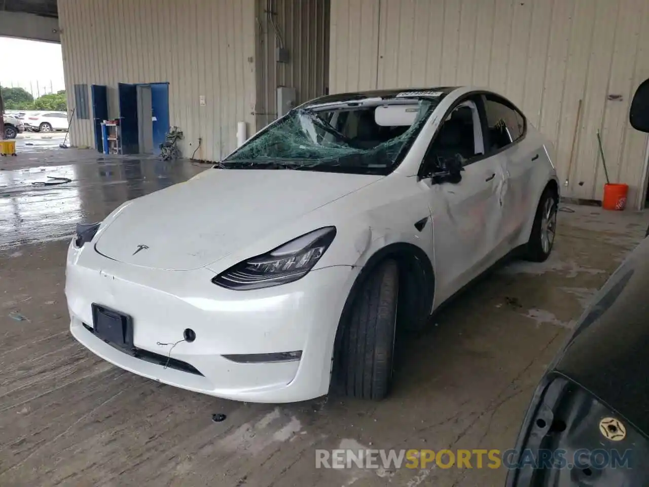 2 Photograph of a damaged car 5YJYGDEE3MF208276 TESLA MODEL Y 2021