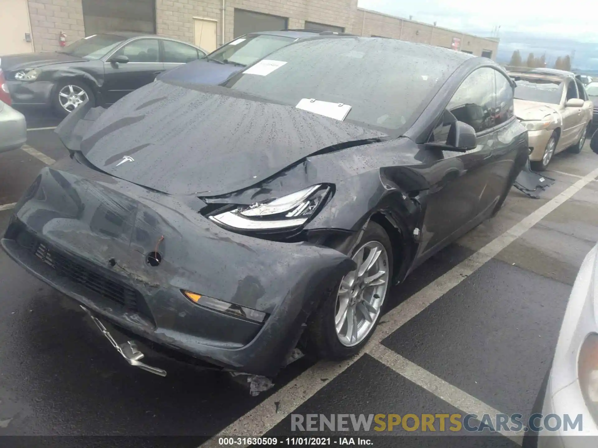 2 Photograph of a damaged car 5YJYGDEE4MF060476 TESLA MODEL Y 2021