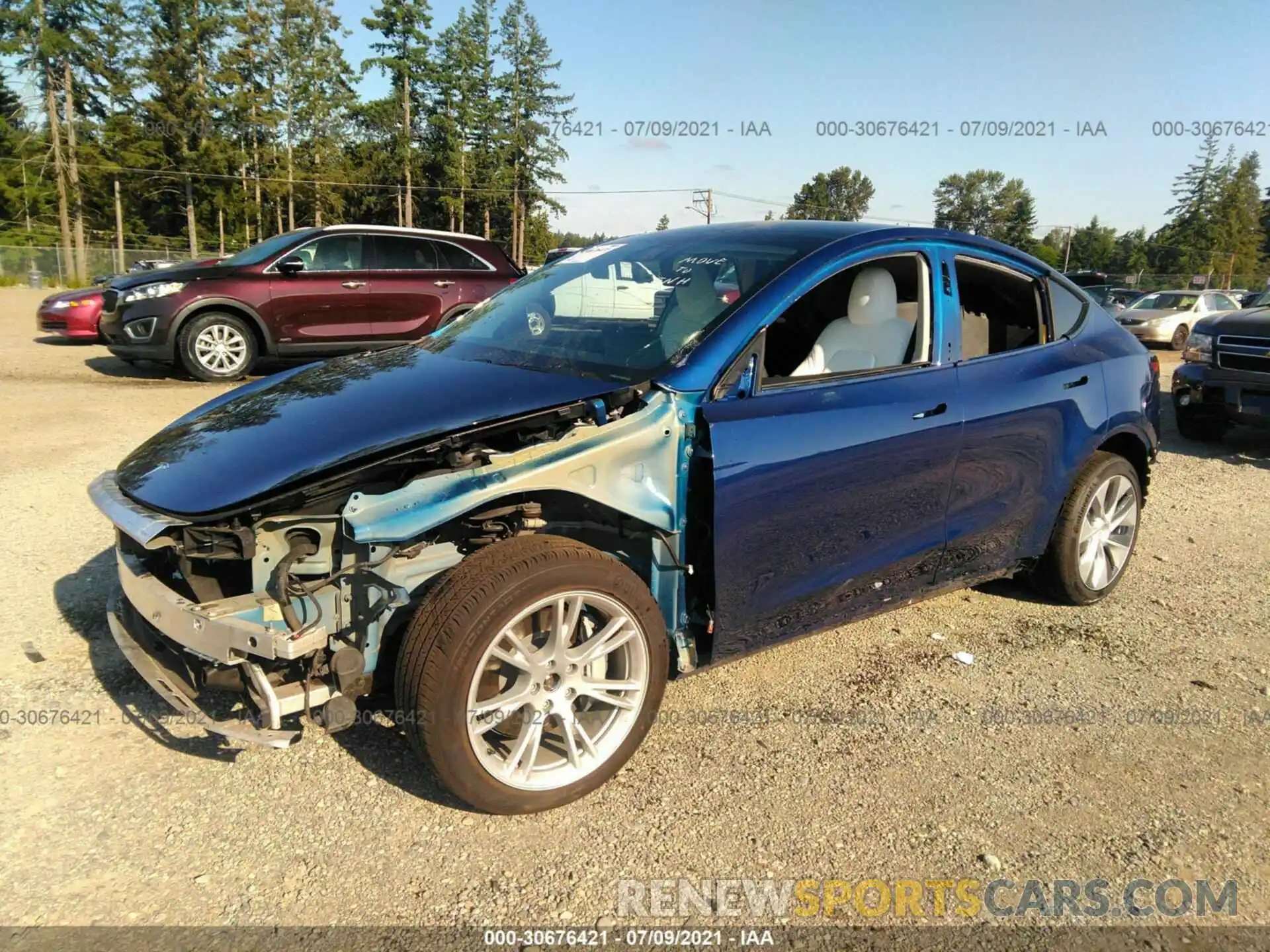 2 Photograph of a damaged car 5YJYGDEE4MF074829 TESLA MODEL Y 2021