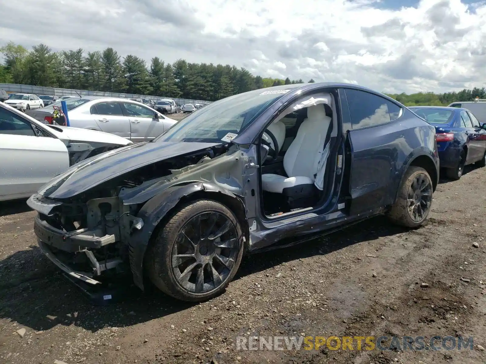 2 Photograph of a damaged car 5YJYGDEE4MF078993 TESLA MODEL Y 2021