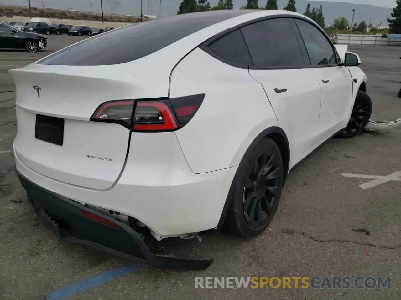 4 Photograph of a damaged car 5YJYGDEE4MF084843 TESLA MODEL Y 2021