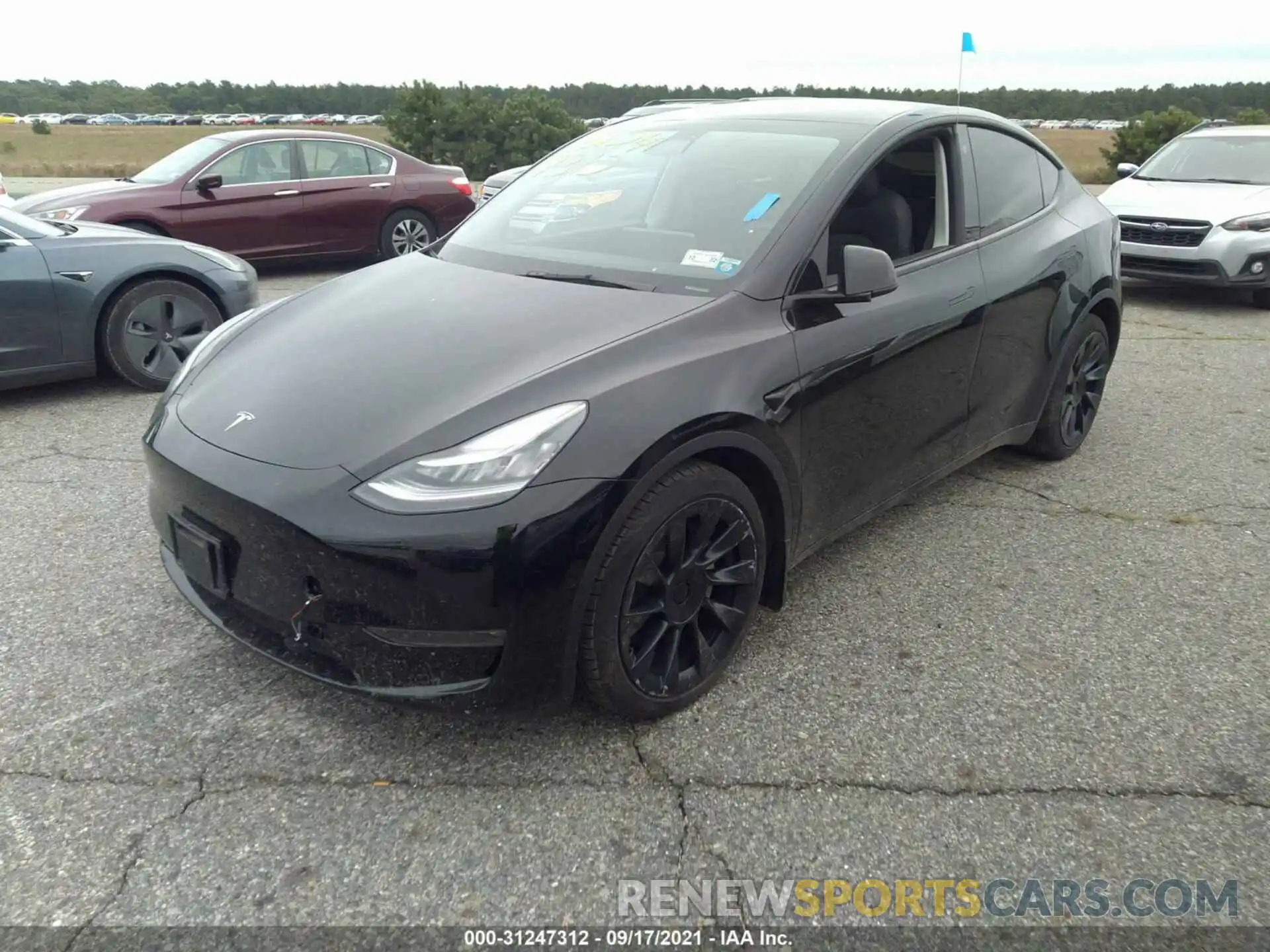 2 Photograph of a damaged car 5YJYGDEE4MF091226 TESLA MODEL Y 2021