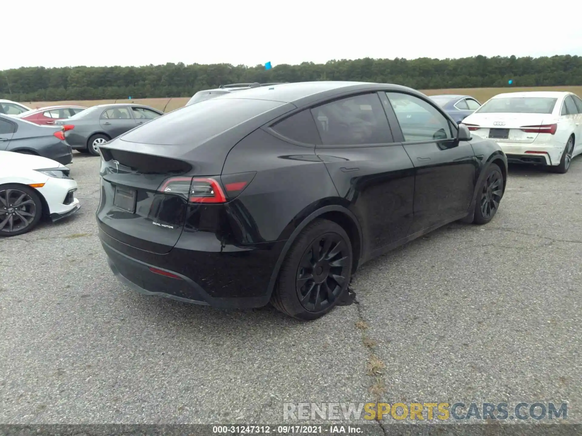 4 Photograph of a damaged car 5YJYGDEE4MF091226 TESLA MODEL Y 2021