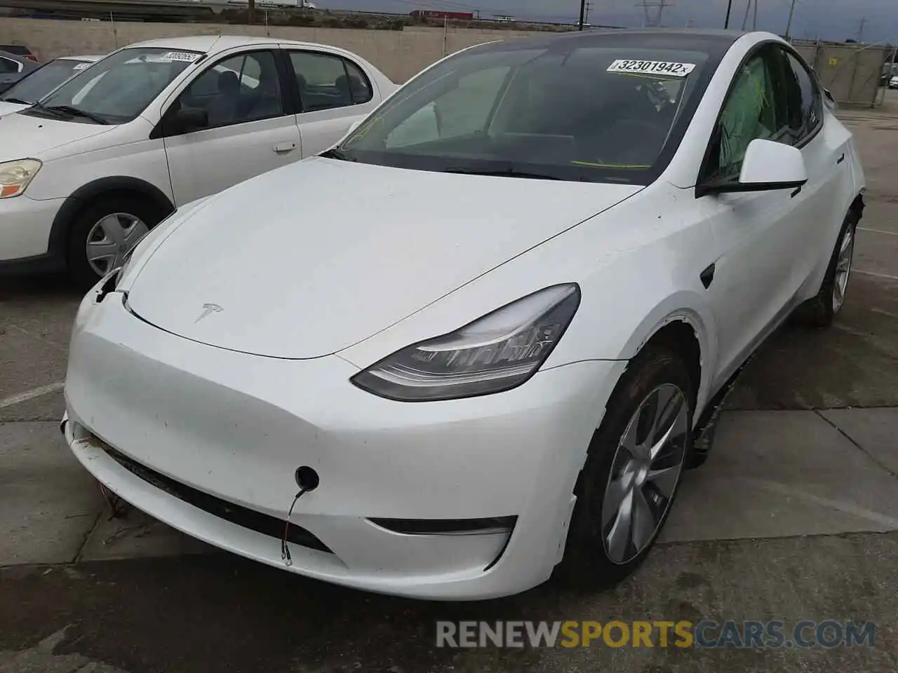 2 Photograph of a damaged car 5YJYGDEE4MF145625 TESLA MODEL Y 2021