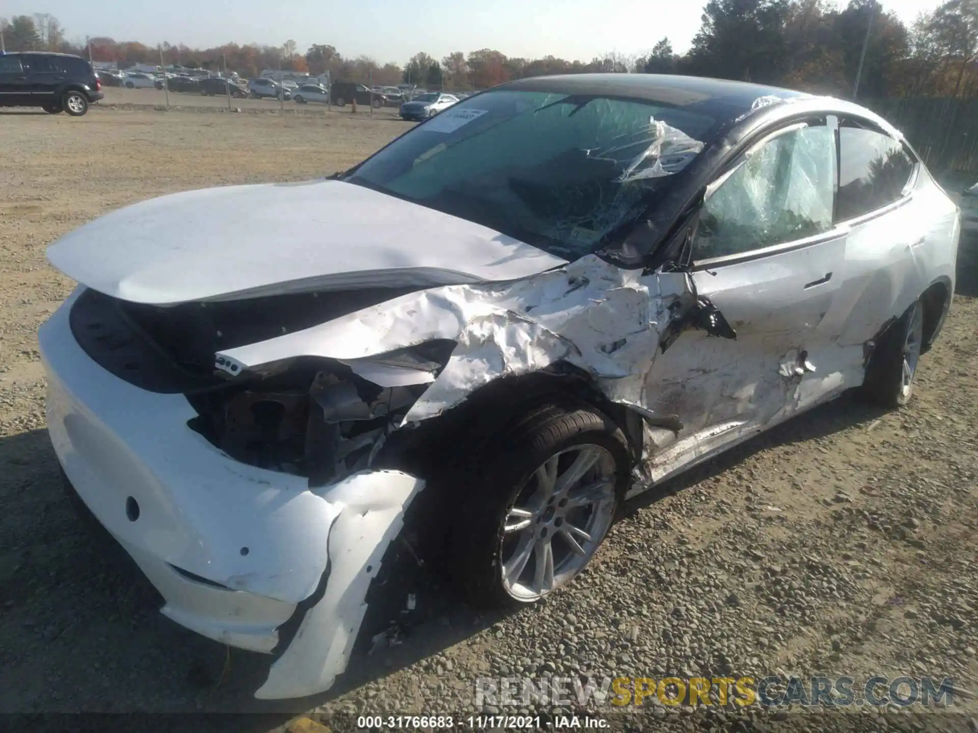 2 Photograph of a damaged car 5YJYGDEE4MF146483 TESLA MODEL Y 2021