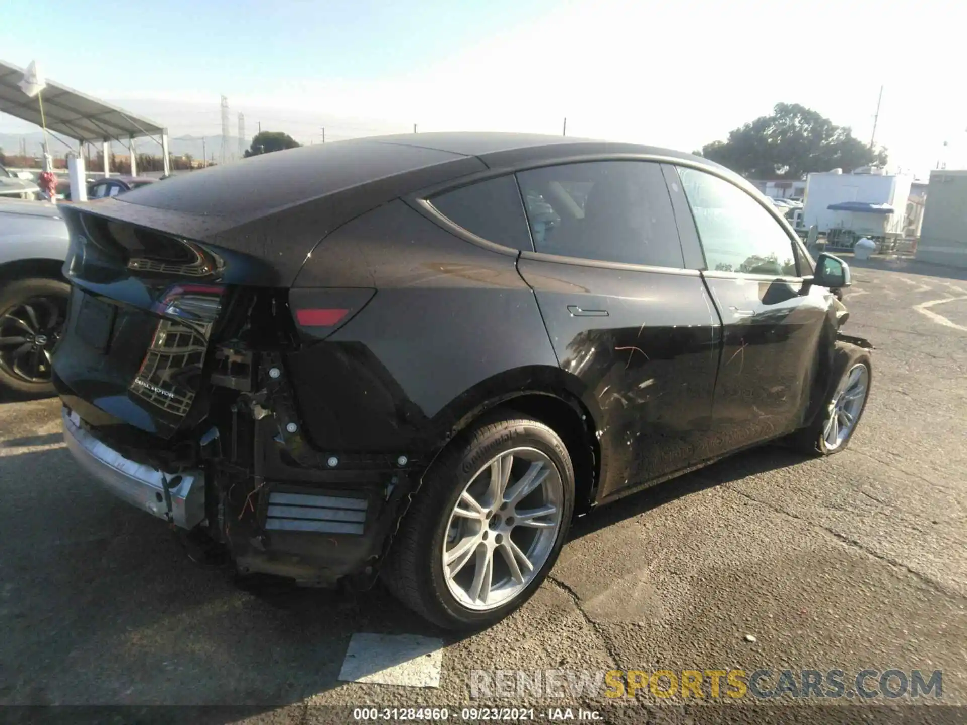 4 Photograph of a damaged car 5YJYGDEE4MF161162 TESLA MODEL Y 2021