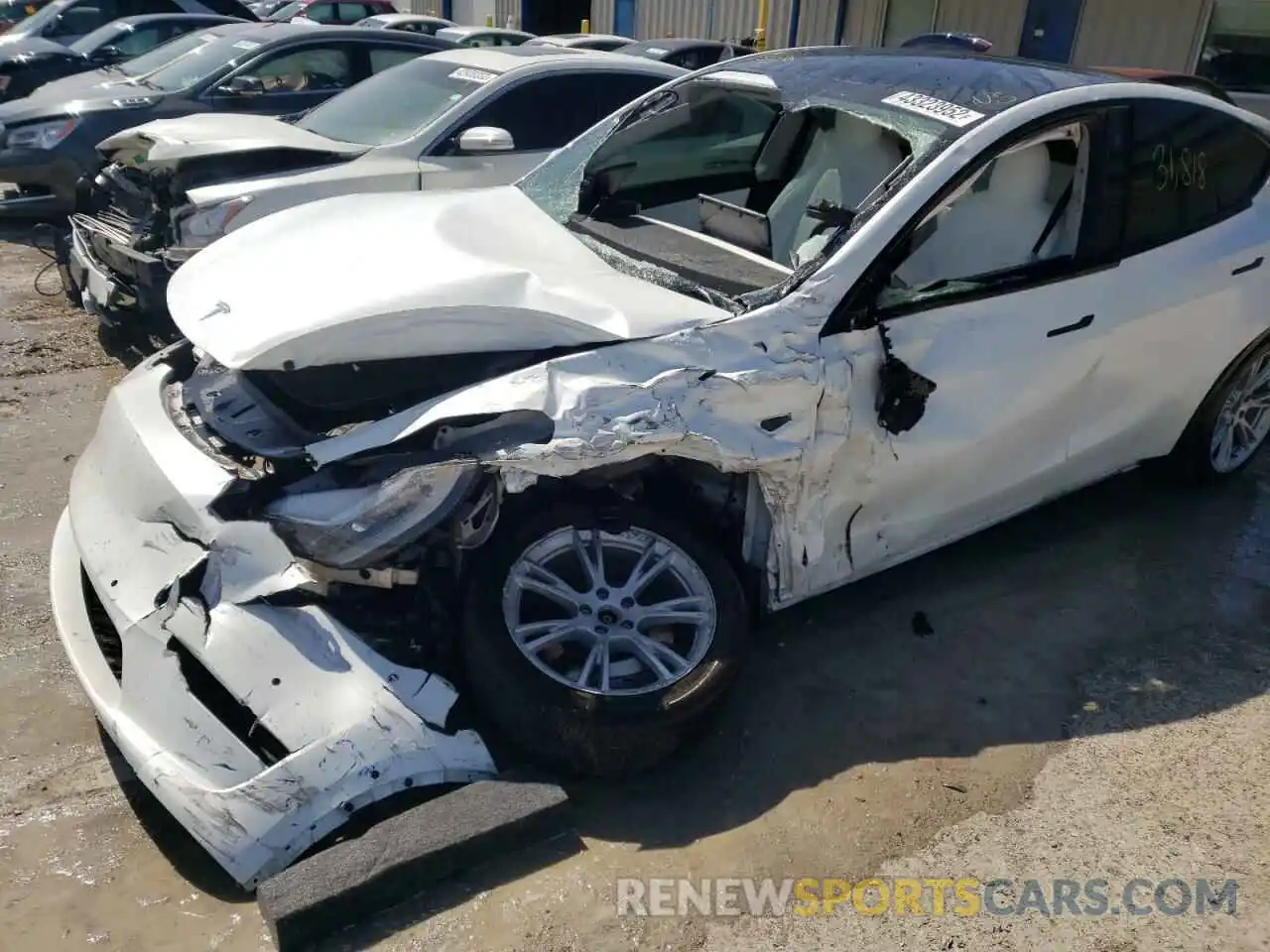 9 Photograph of a damaged car 5YJYGDEE4MF189950 TESLA MODEL Y 2021