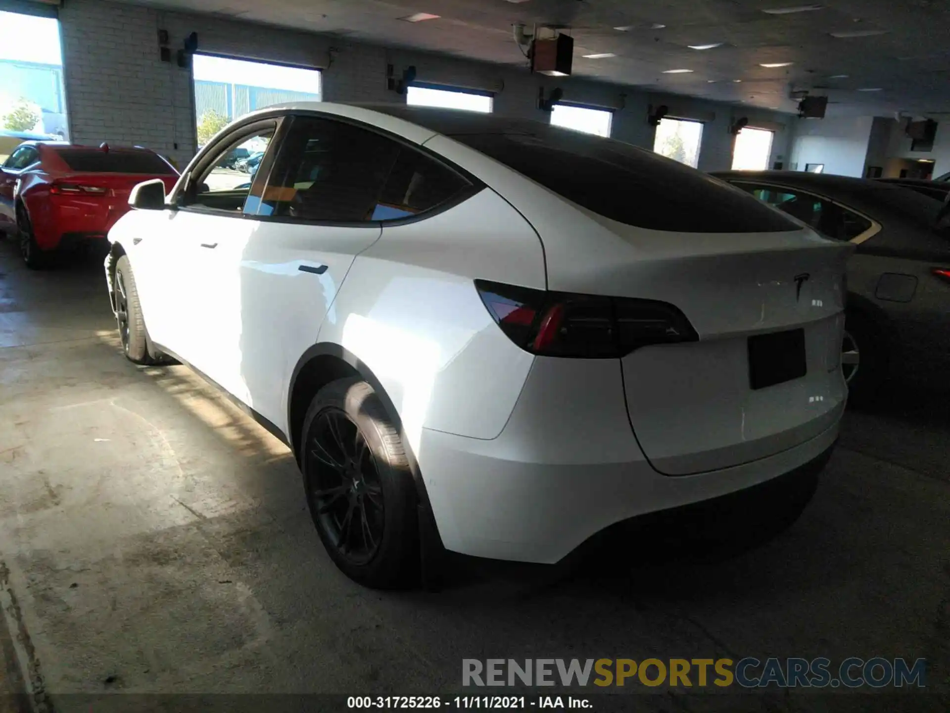 3 Photograph of a damaged car 5YJYGDEE4MF194324 TESLA MODEL Y 2021