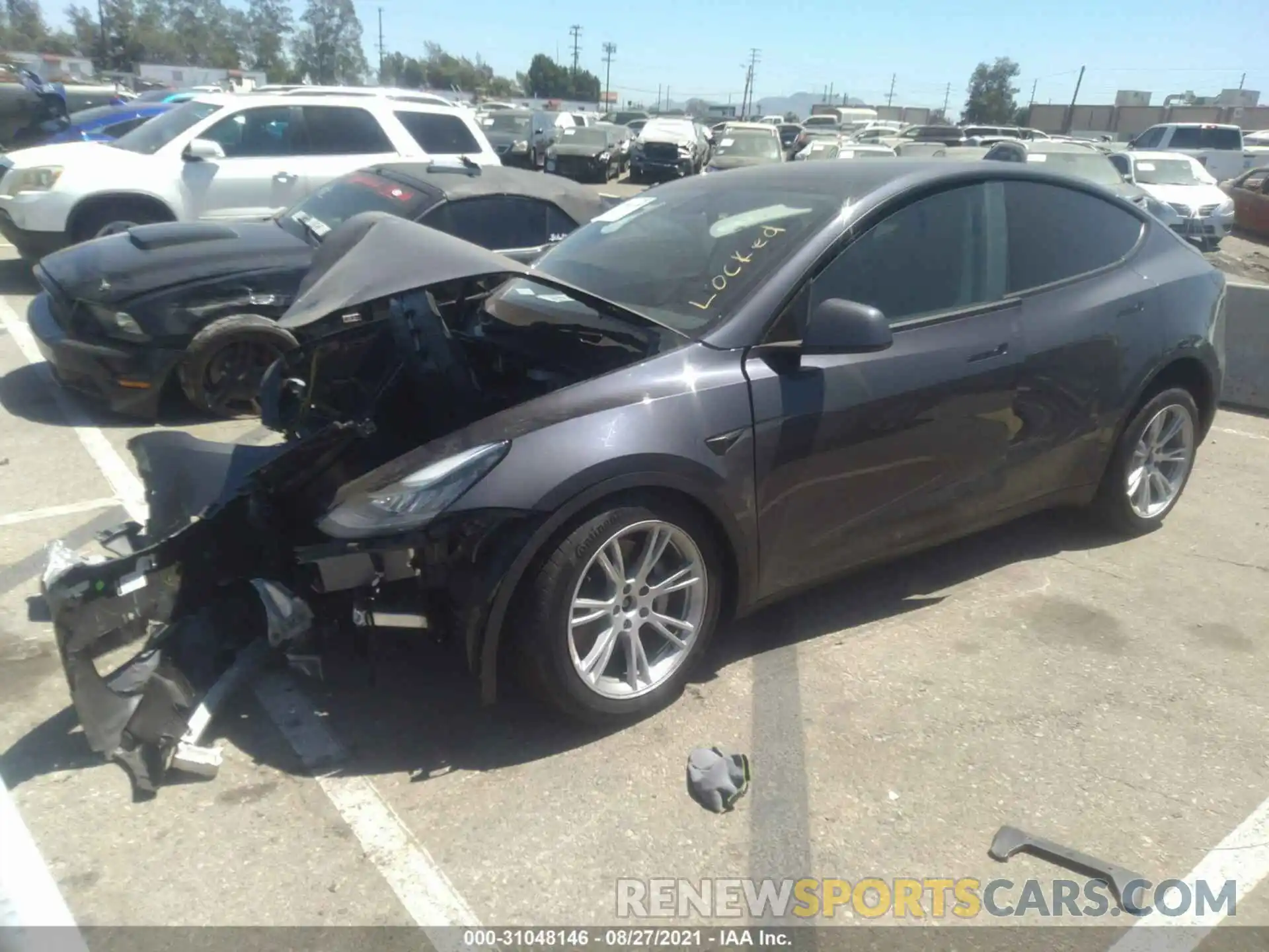 2 Photograph of a damaged car 5YJYGDEE4MF229038 TESLA MODEL Y 2021