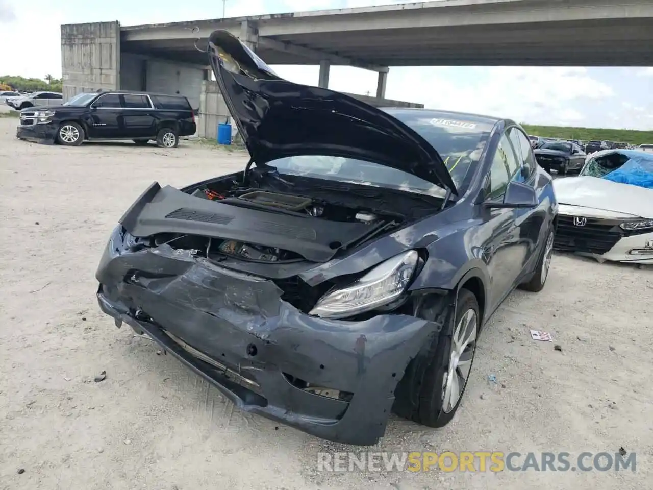 2 Photograph of a damaged car 5YJYGDEE5MF087606 TESLA MODEL Y 2021