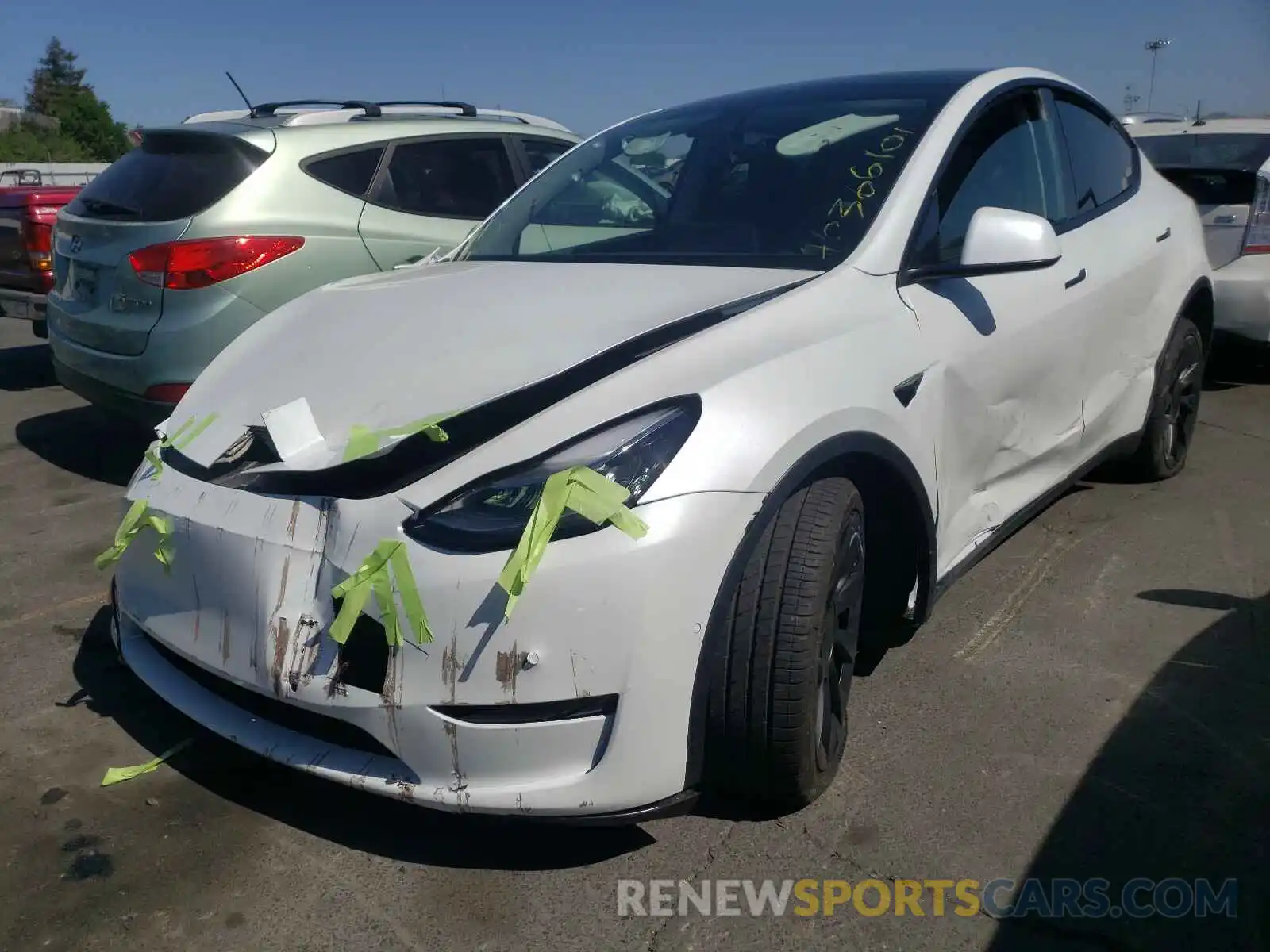 2 Photograph of a damaged car 5YJYGDEE5MF098041 TESLA MODEL Y 2021