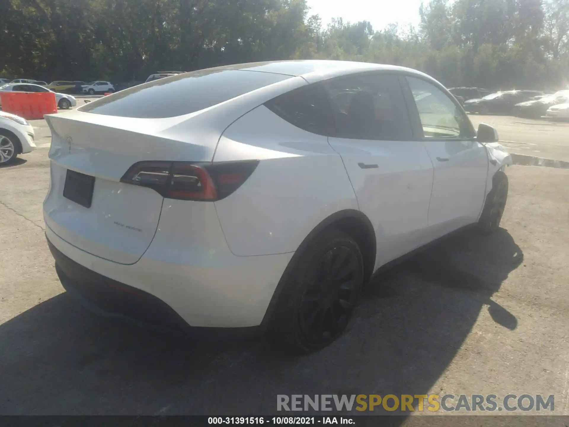 4 Photograph of a damaged car 5YJYGDEE5MF115422 TESLA MODEL Y 2021