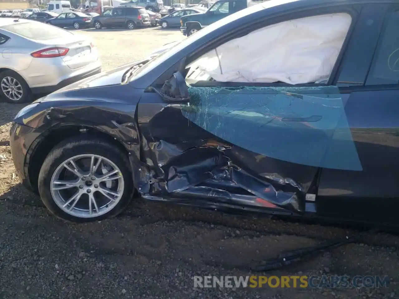 9 Photograph of a damaged car 5YJYGDEE5MF157458 TESLA MODEL Y 2021