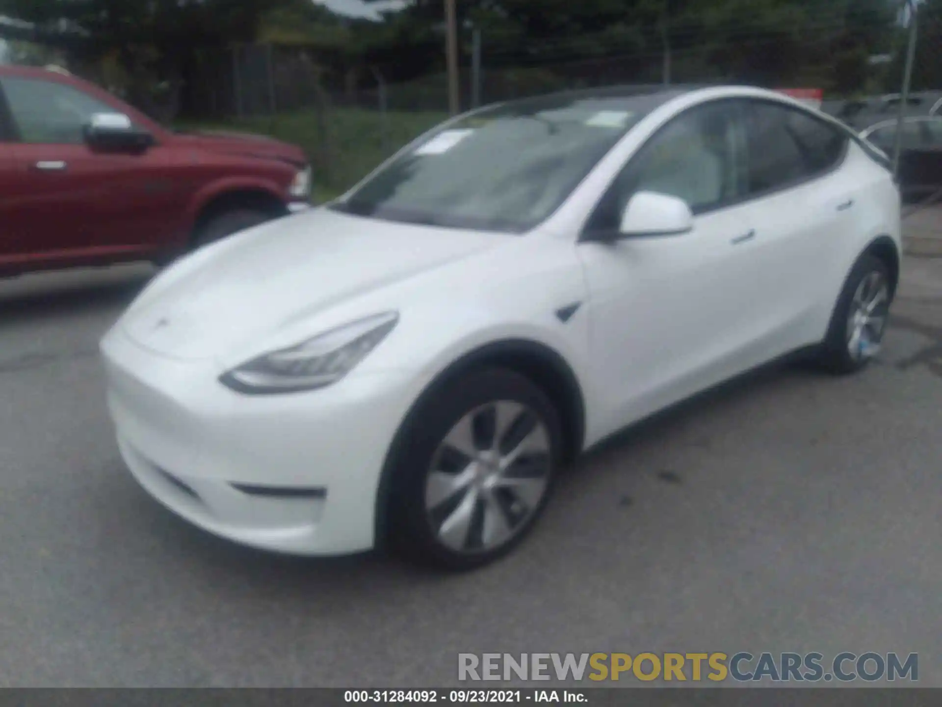 2 Photograph of a damaged car 5YJYGDEE5MF195658 TESLA MODEL Y 2021