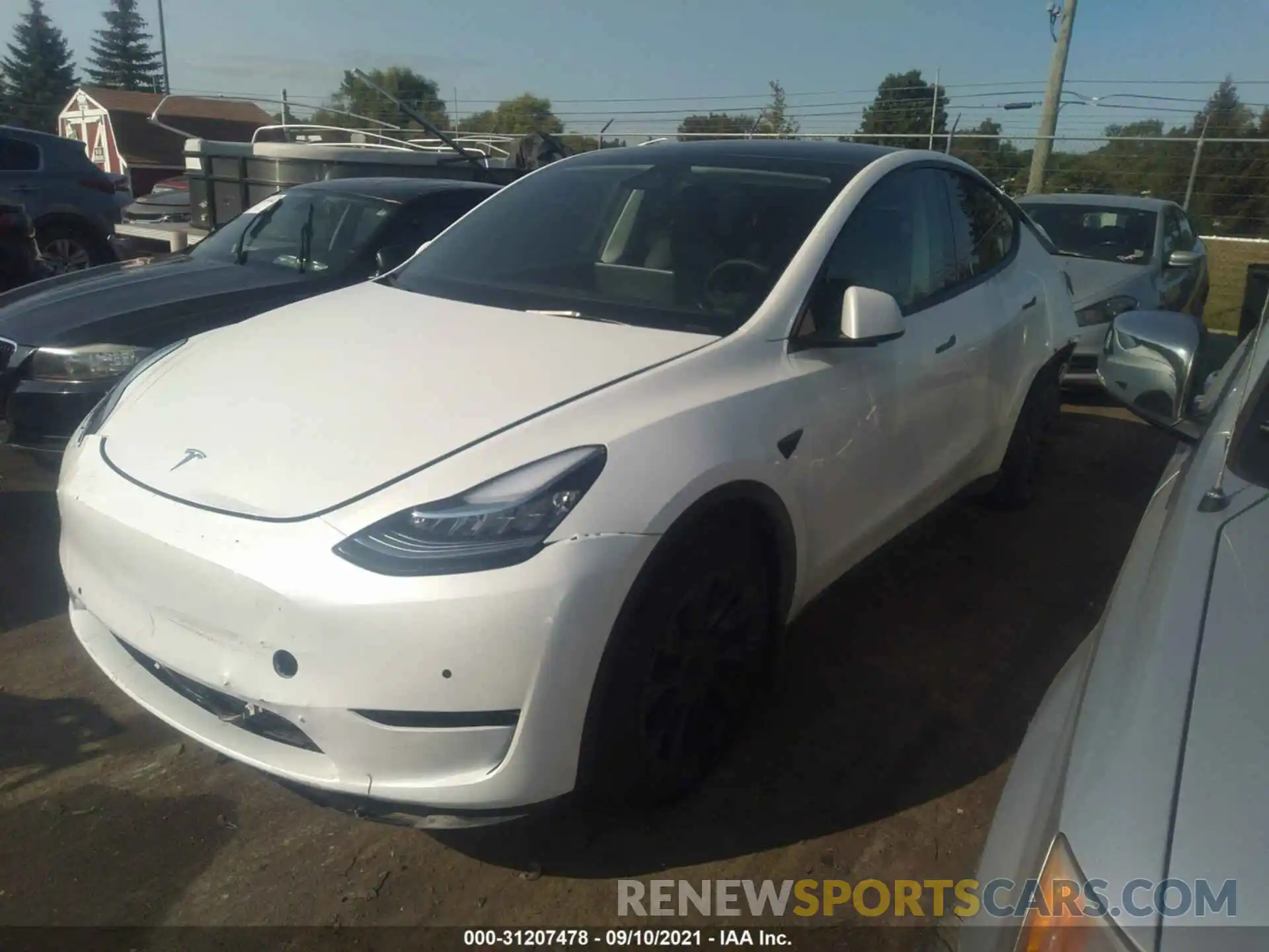 2 Photograph of a damaged car 5YJYGDEE5MF209333 TESLA MODEL Y 2021