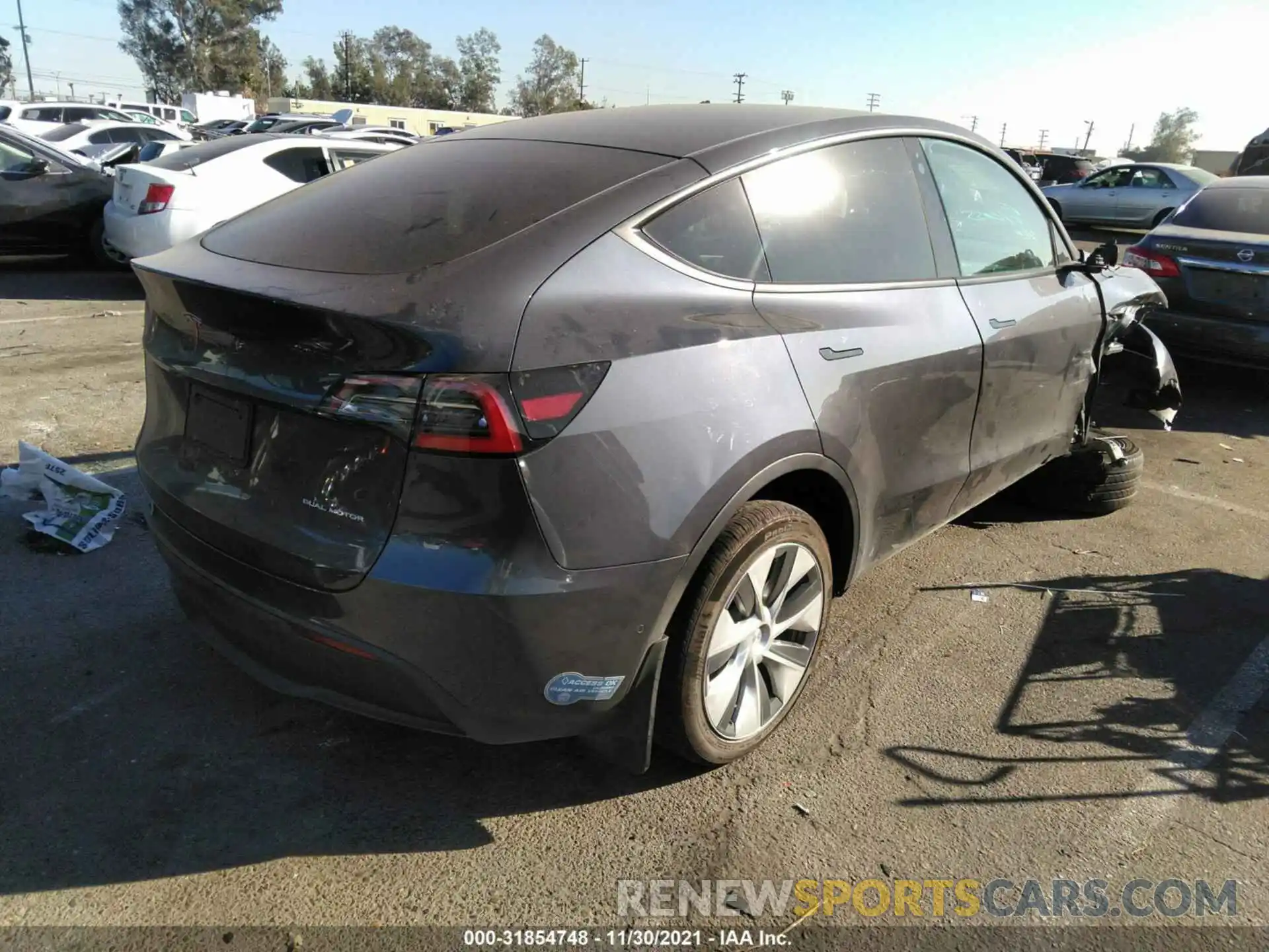 4 Photograph of a damaged car 5YJYGDEE6MF088697 TESLA MODEL Y 2021