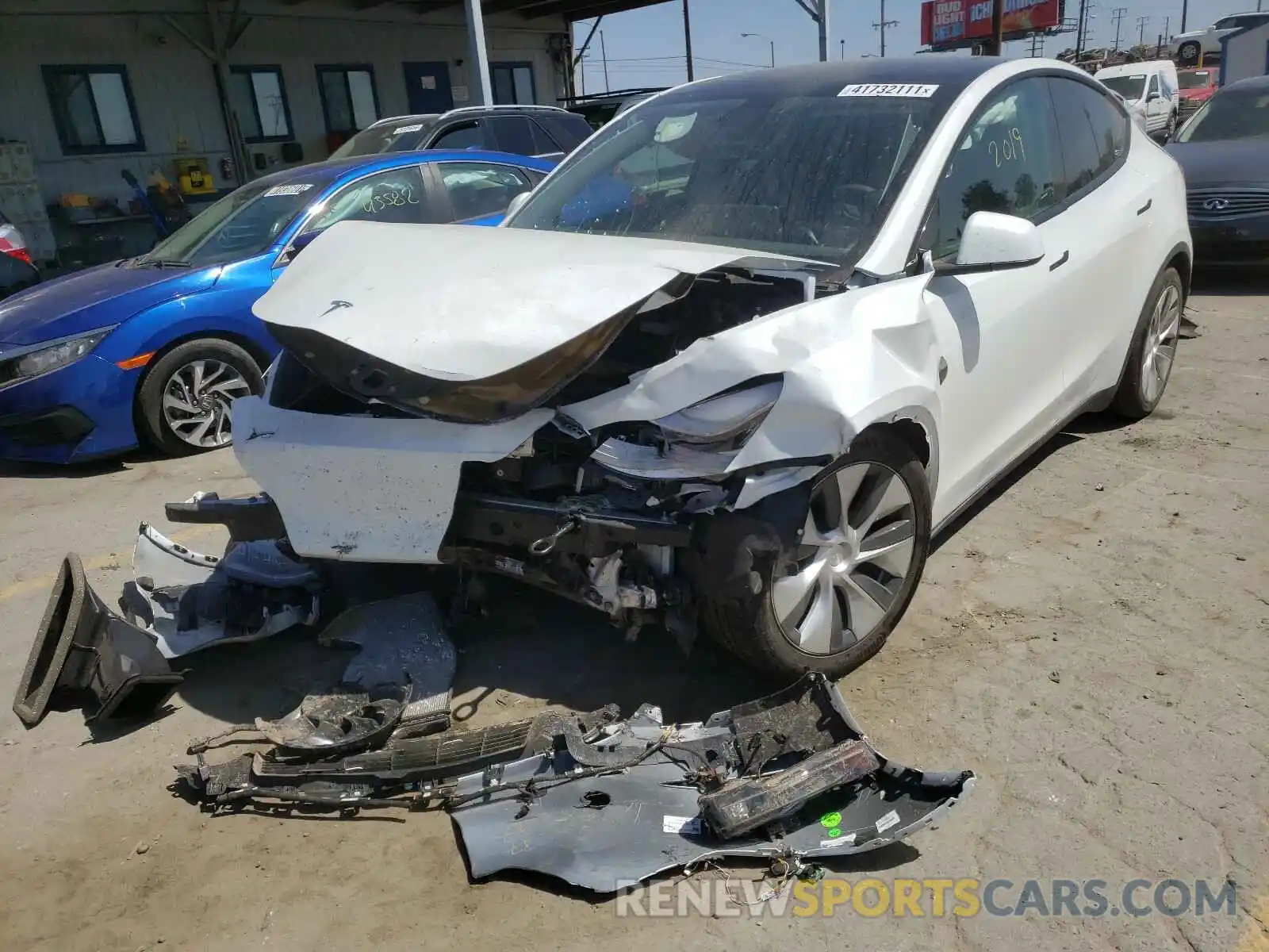 2 Photograph of a damaged car 5YJYGDEE6MF160935 TESLA MODEL Y 2021