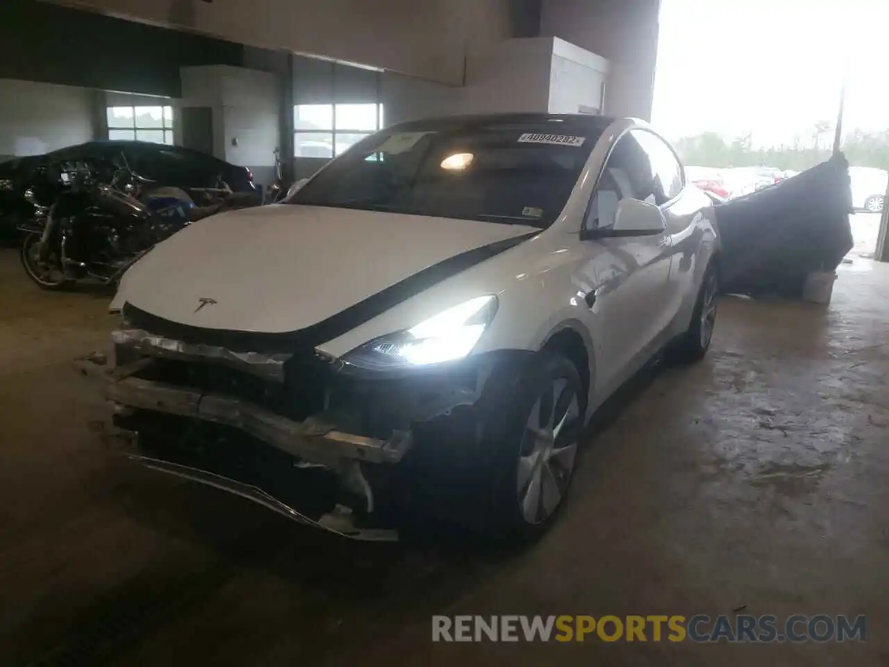 2 Photograph of a damaged car 5YJYGDEE6MF181851 TESLA MODEL Y 2021