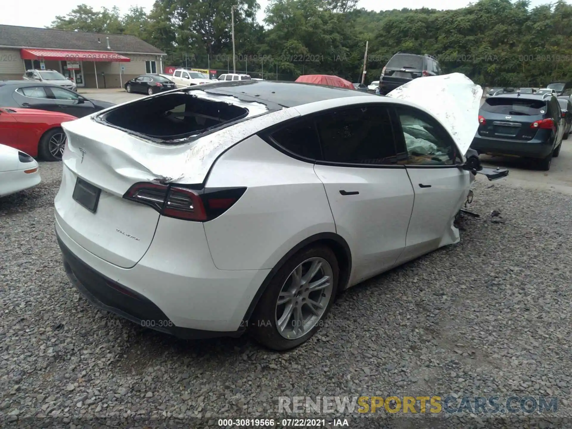 4 Photograph of a damaged car 5YJYGDEE6MF194471 TESLA MODEL Y 2021