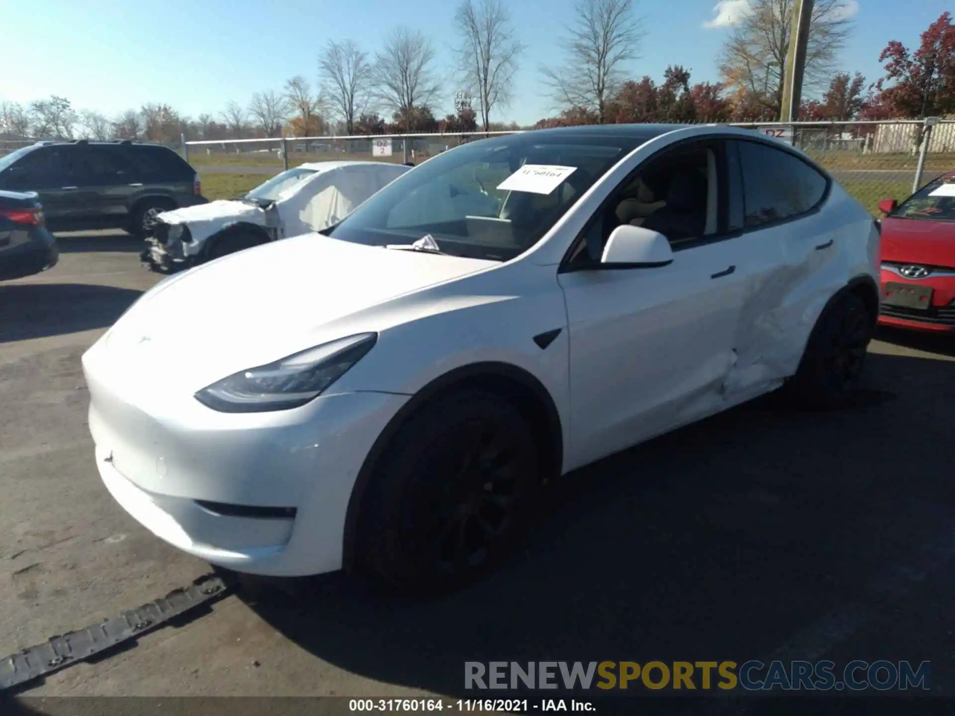 2 Photograph of a damaged car 5YJYGDEE6MF233091 TESLA MODEL Y 2021