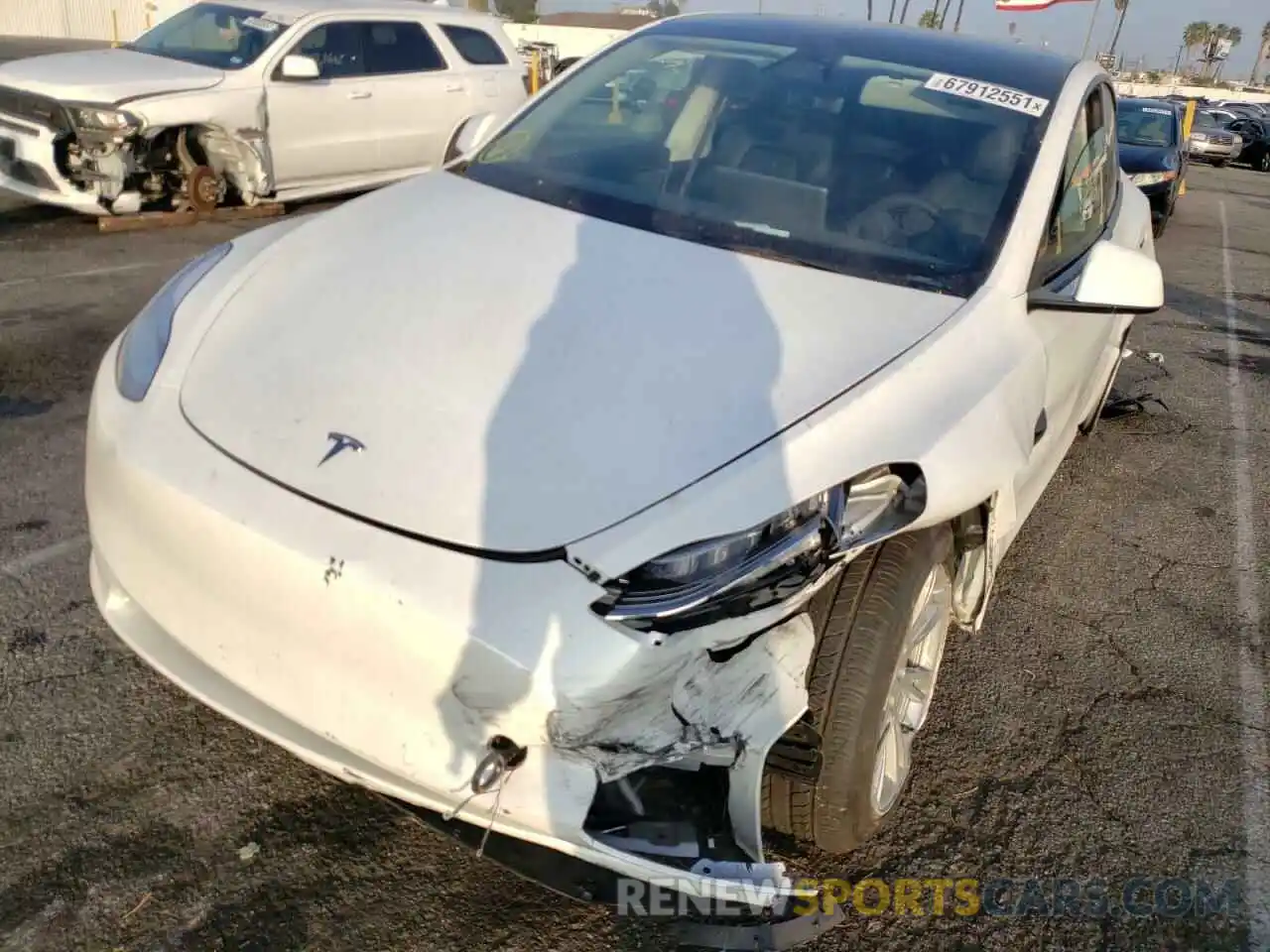 2 Photograph of a damaged car 5YJYGDEE6MF264325 TESLA MODEL Y 2021