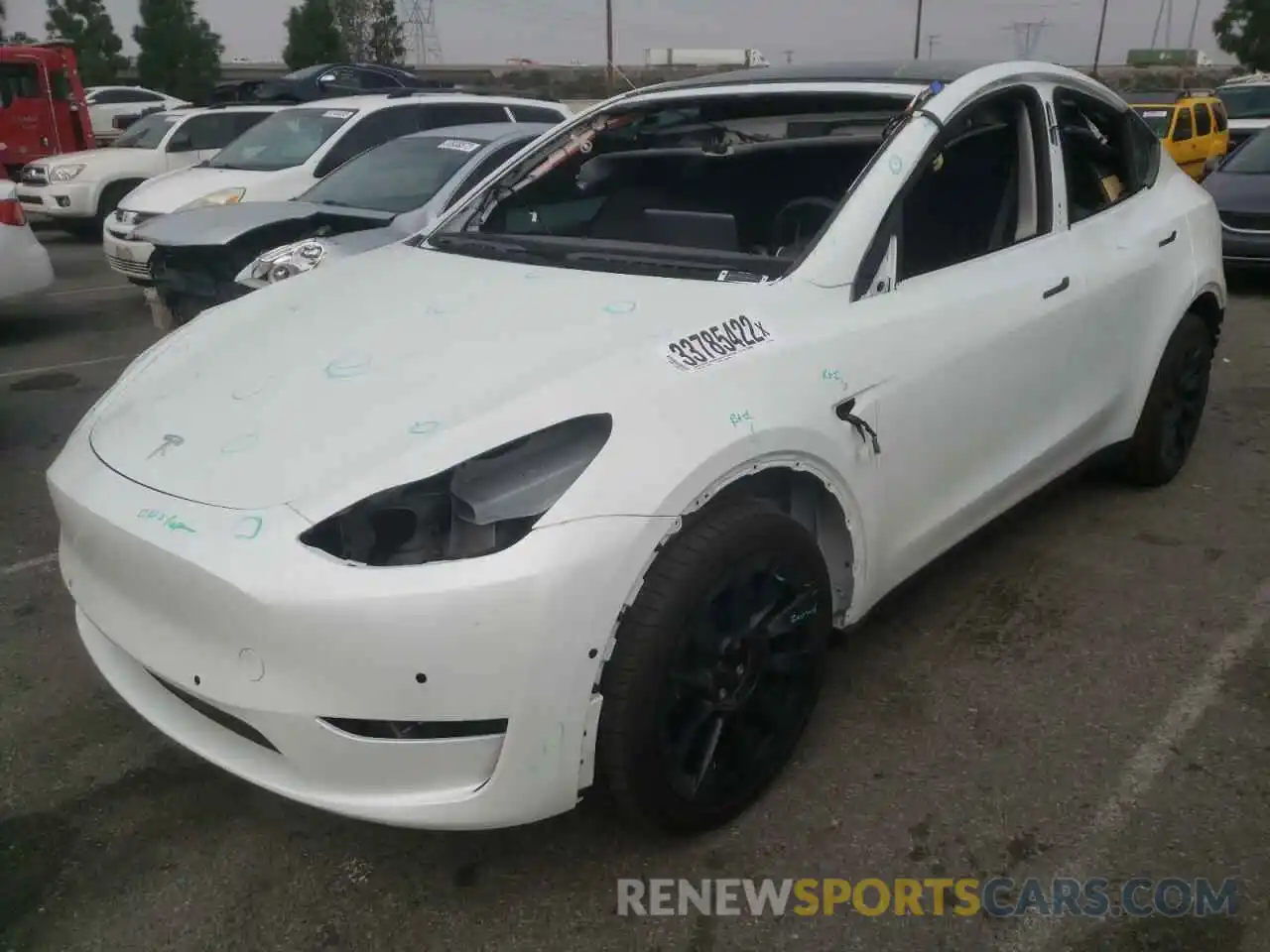 2 Photograph of a damaged car 5YJYGDEE6MF296028 TESLA MODEL Y 2021