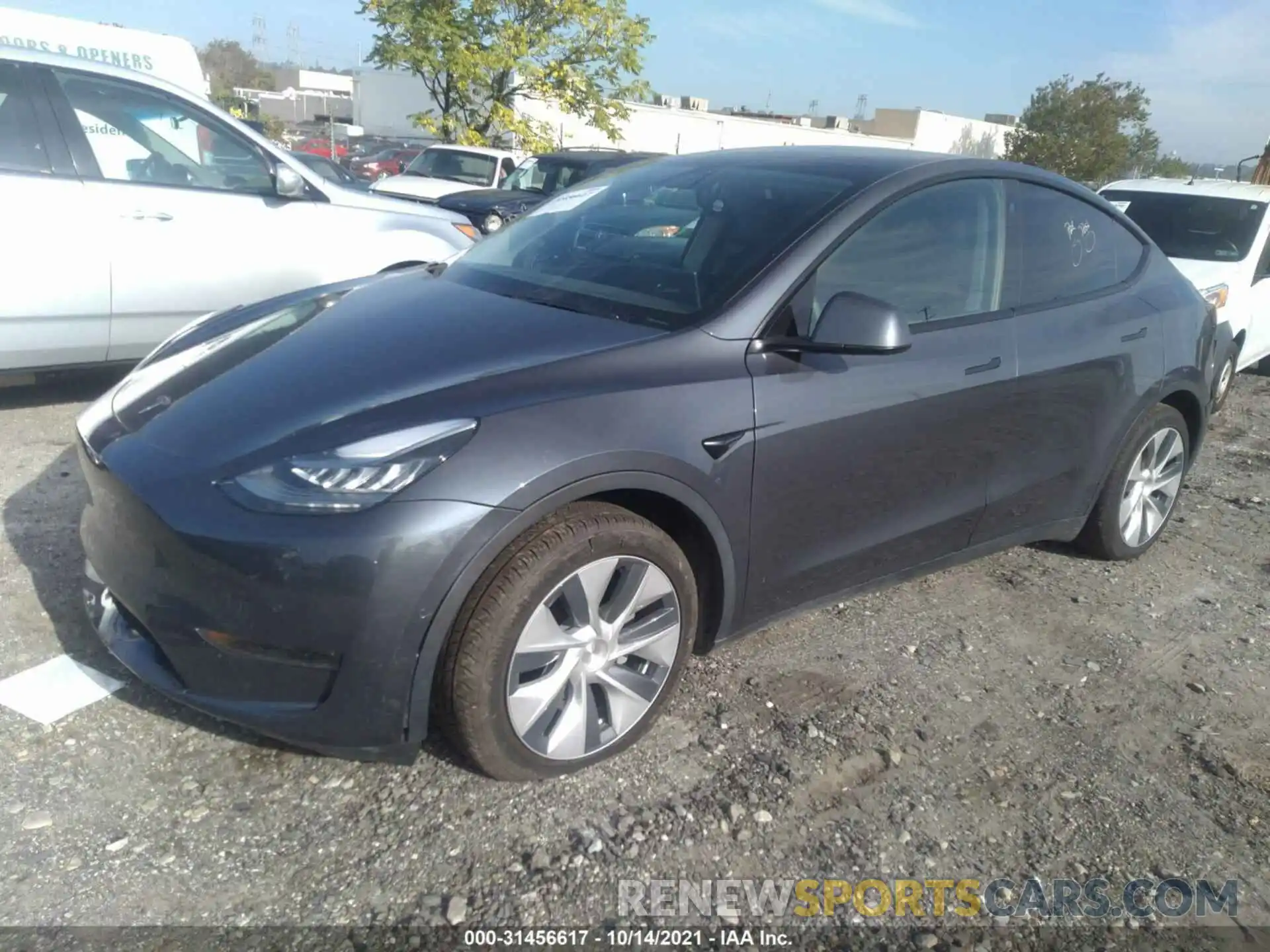 2 Photograph of a damaged car 5YJYGDEE7MF060553 TESLA MODEL Y 2021