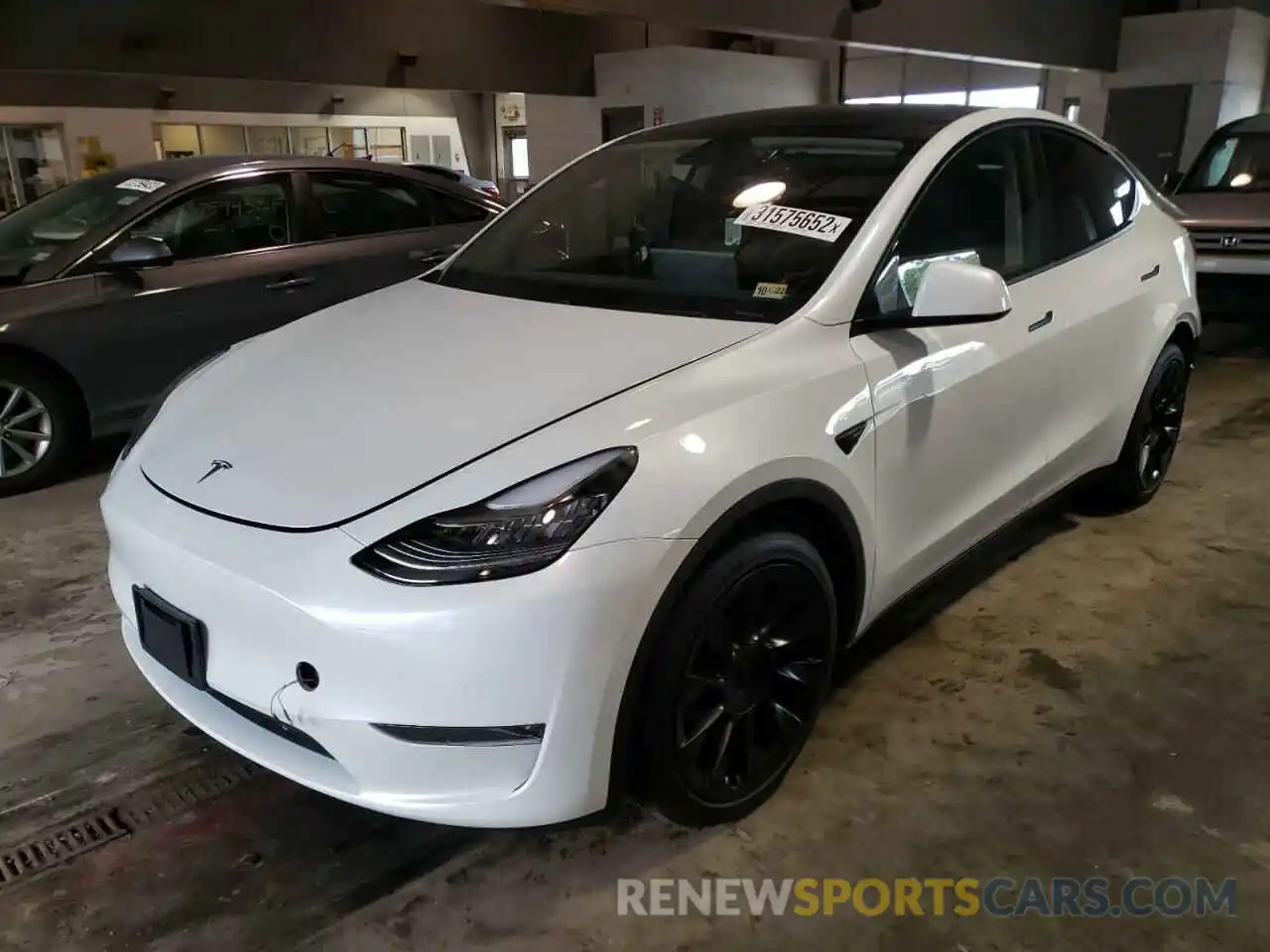 2 Photograph of a damaged car 5YJYGDEE7MF075344 TESLA MODEL Y 2021