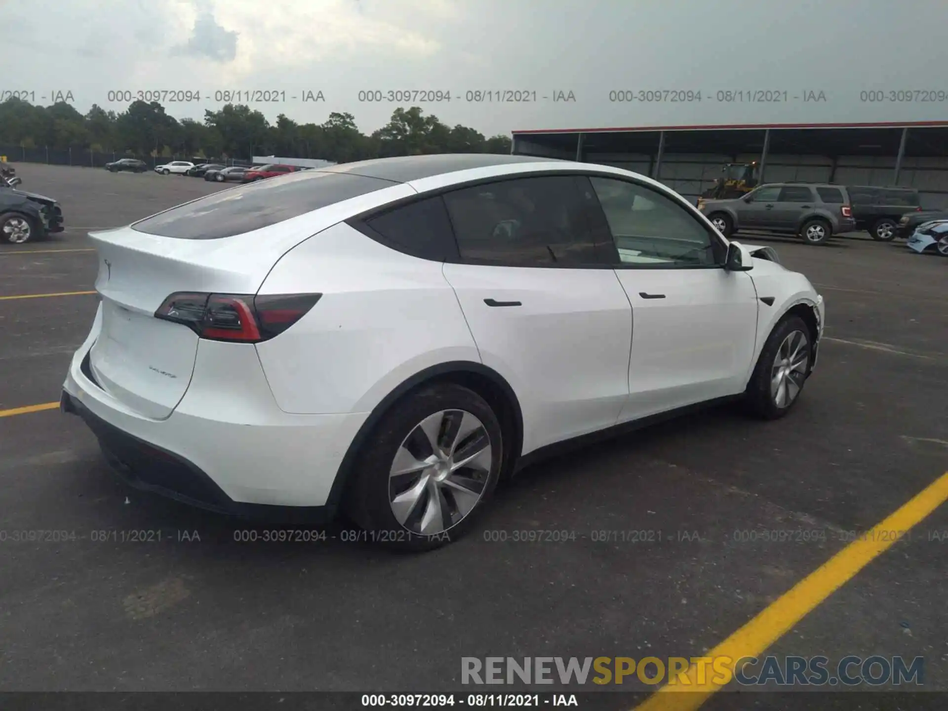 4 Photograph of a damaged car 5YJYGDEE7MF083086 TESLA MODEL Y 2021