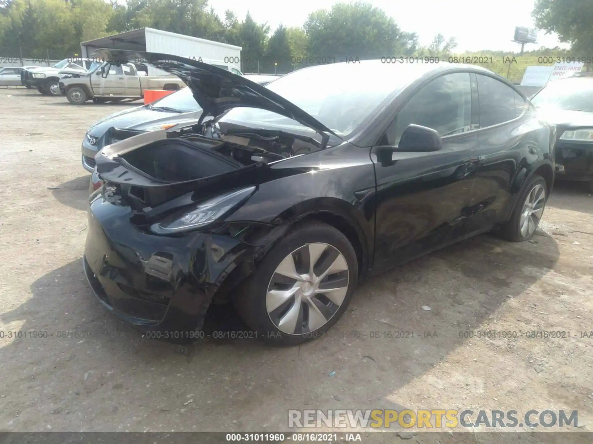 2 Photograph of a damaged car 5YJYGDEE7MF087266 TESLA MODEL Y 2021