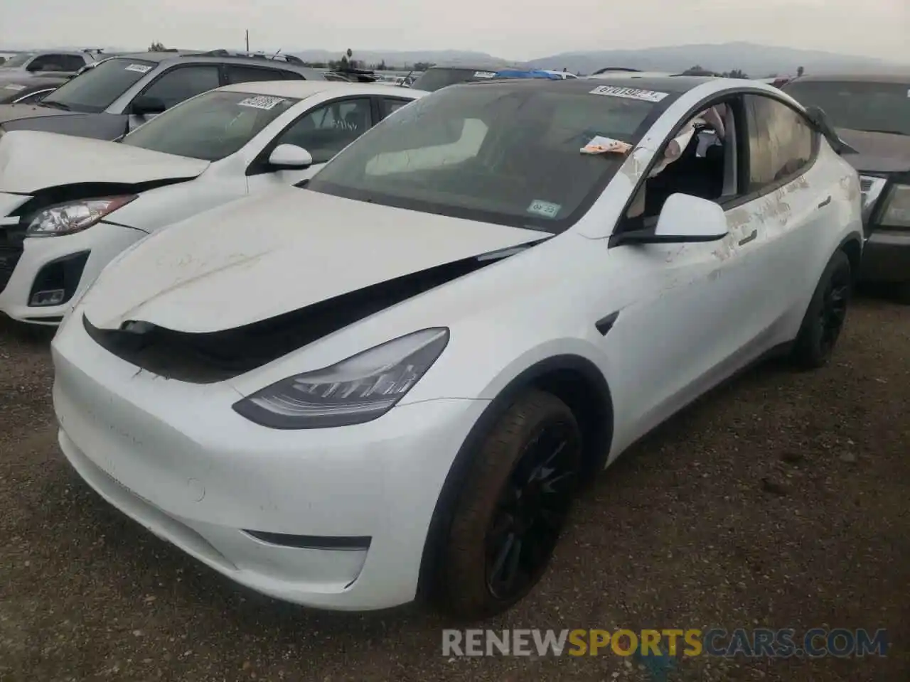 2 Photograph of a damaged car 5YJYGDEE7MF122548 TESLA MODEL Y 2021