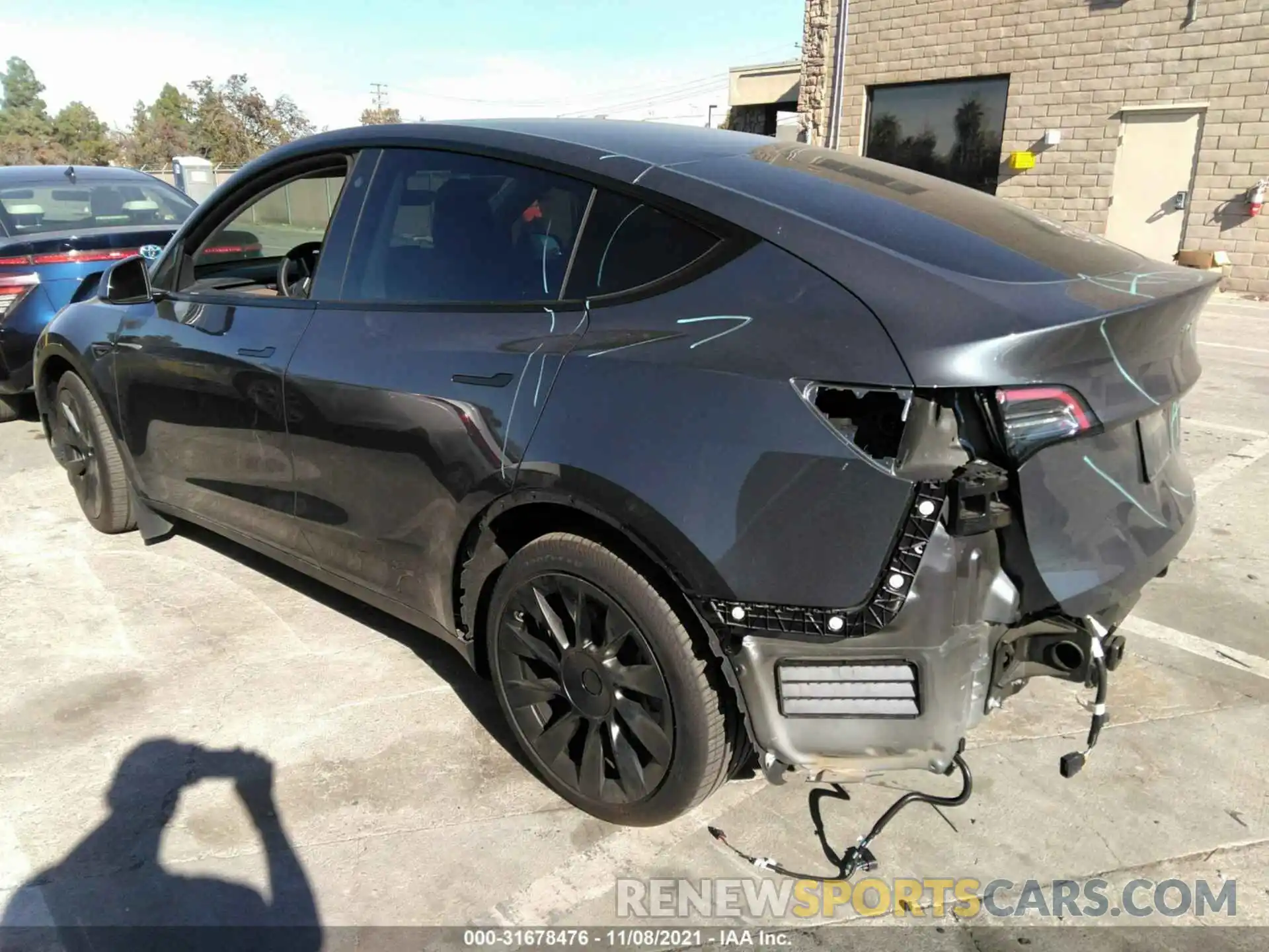 3 Photograph of a damaged car 5YJYGDEE7MF152911 TESLA MODEL Y 2021