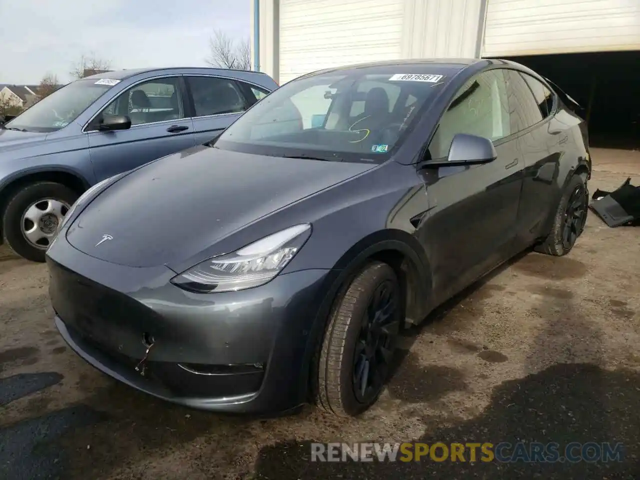 2 Photograph of a damaged car 5YJYGDEE7MF174696 TESLA MODEL Y 2021