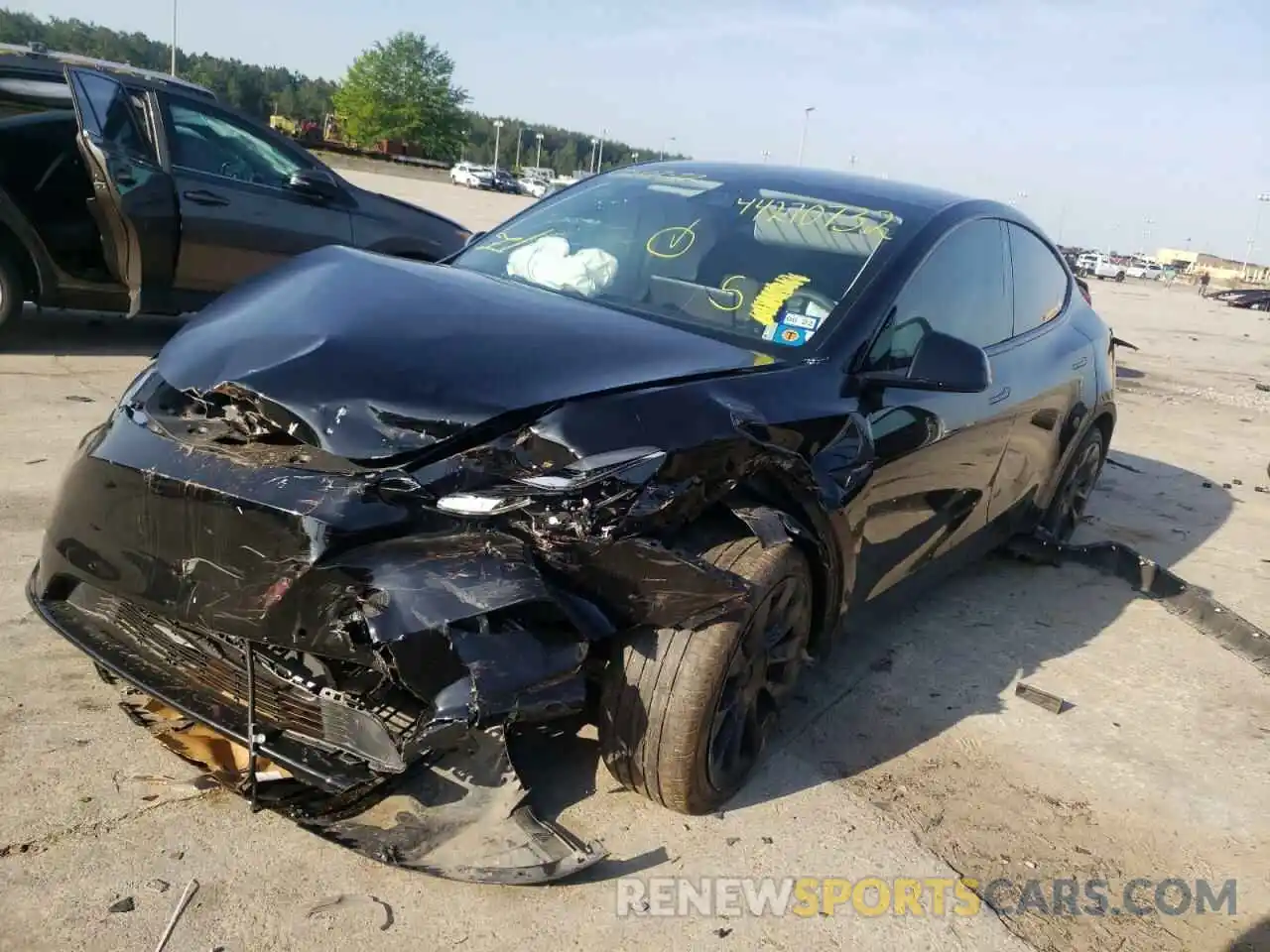 2 Photograph of a damaged car 5YJYGDEE7MF208149 TESLA MODEL Y 2021