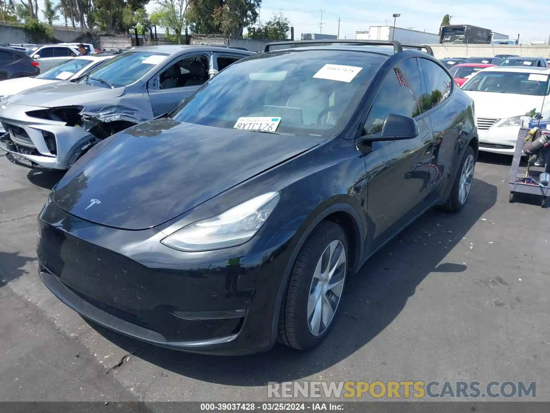 2 Photograph of a damaged car 5YJYGDEE7MF224609 TESLA MODEL Y 2021