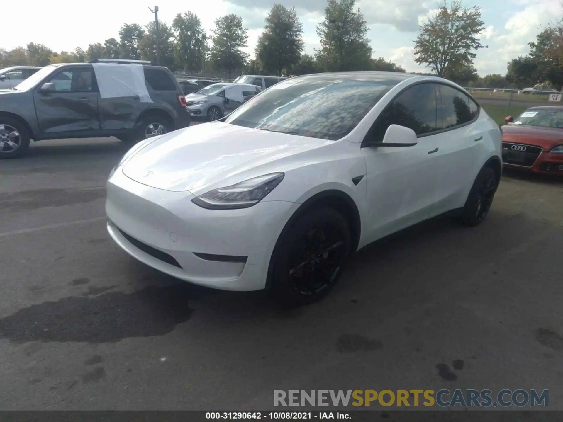 2 Photograph of a damaged car 5YJYGDEE8MF061971 TESLA MODEL Y 2021