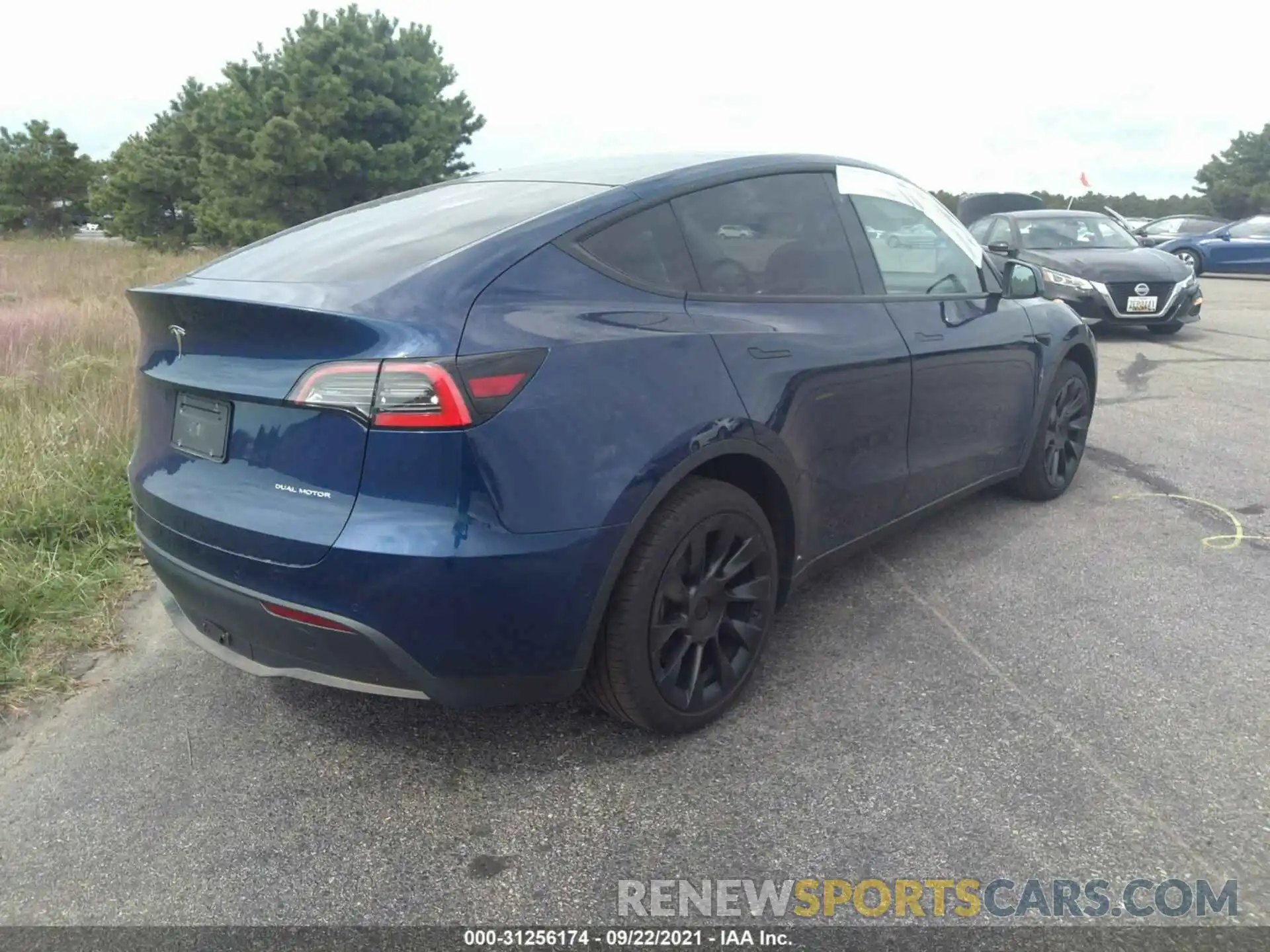 4 Photograph of a damaged car 5YJYGDEE8MF062473 TESLA MODEL Y 2021