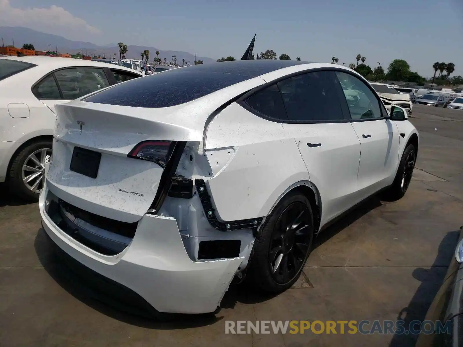 4 Photograph of a damaged car 5YJYGDEE8MF097403 TESLA MODEL Y 2021