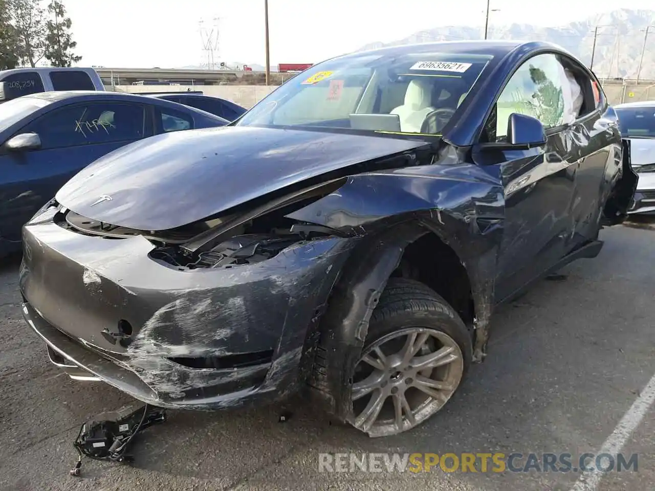 2 Photograph of a damaged car 5YJYGDEE8MF158510 TESLA MODEL Y 2021