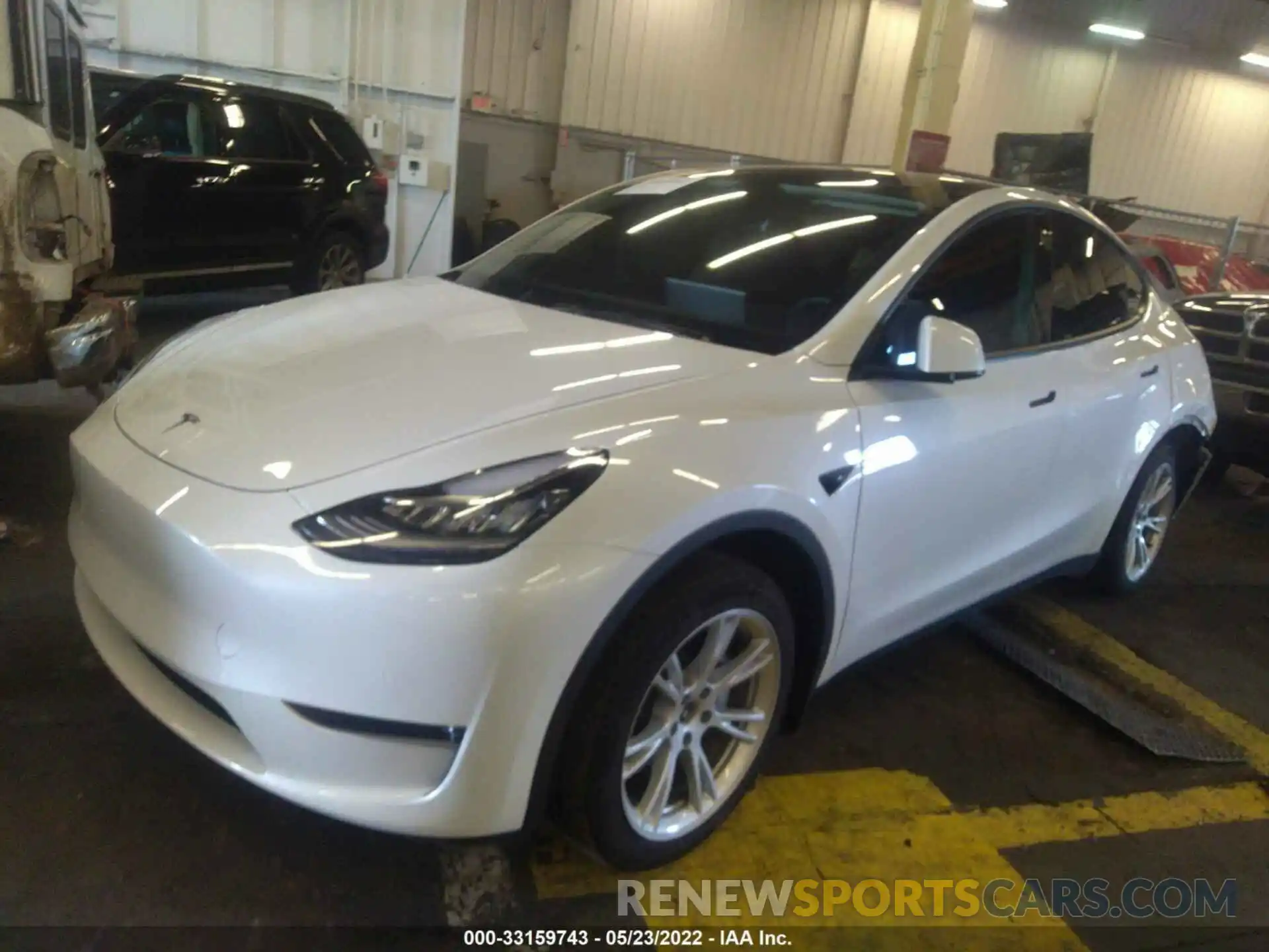 2 Photograph of a damaged car 5YJYGDEE8MF214199 TESLA MODEL Y 2021