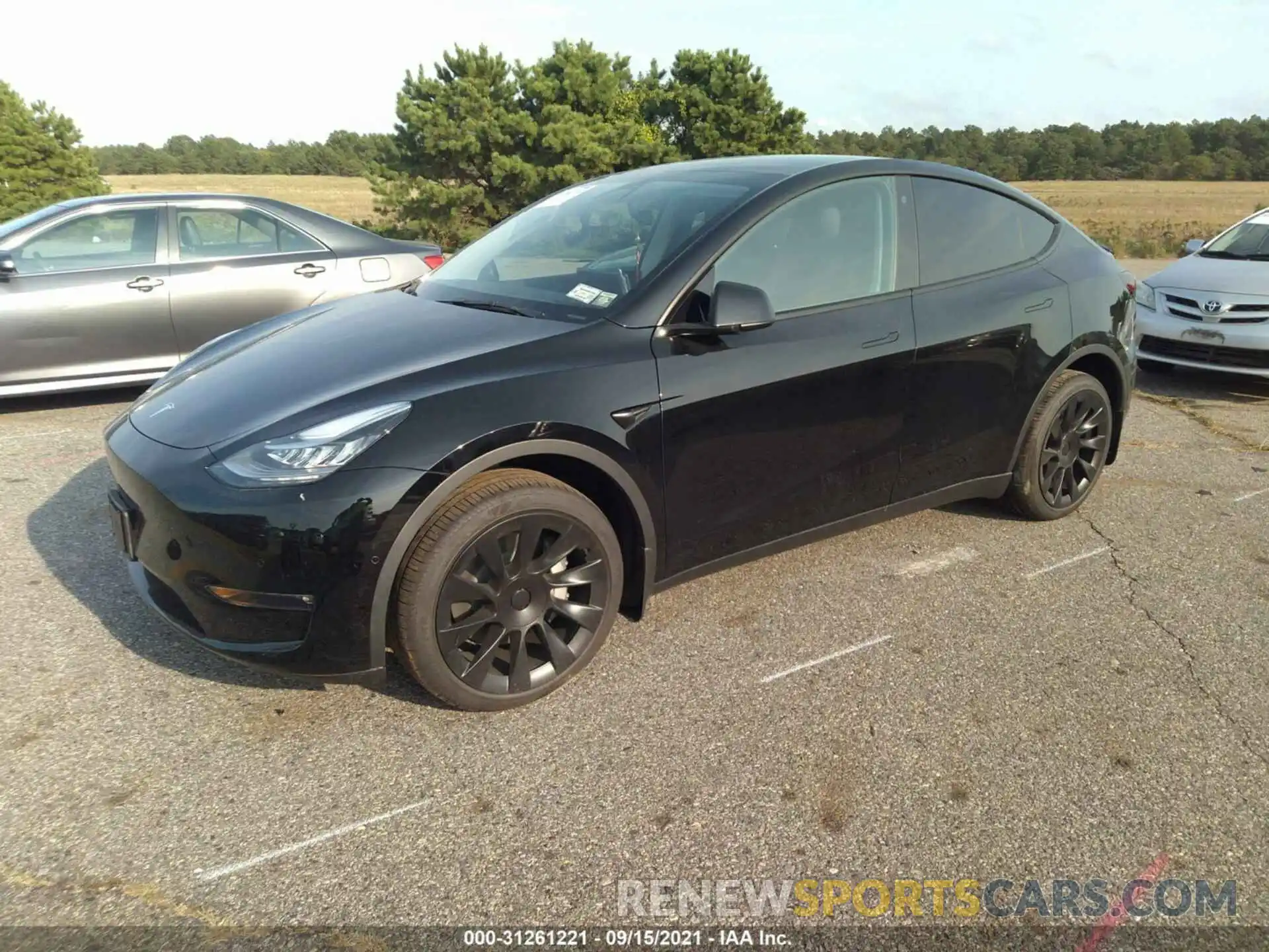 2 Photograph of a damaged car 5YJYGDEE8MF233691 TESLA MODEL Y 2021