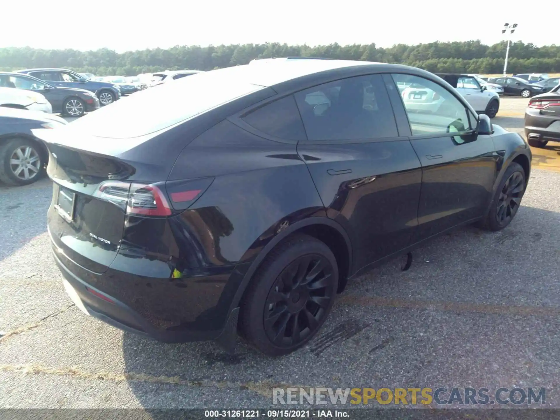 4 Photograph of a damaged car 5YJYGDEE8MF233691 TESLA MODEL Y 2021