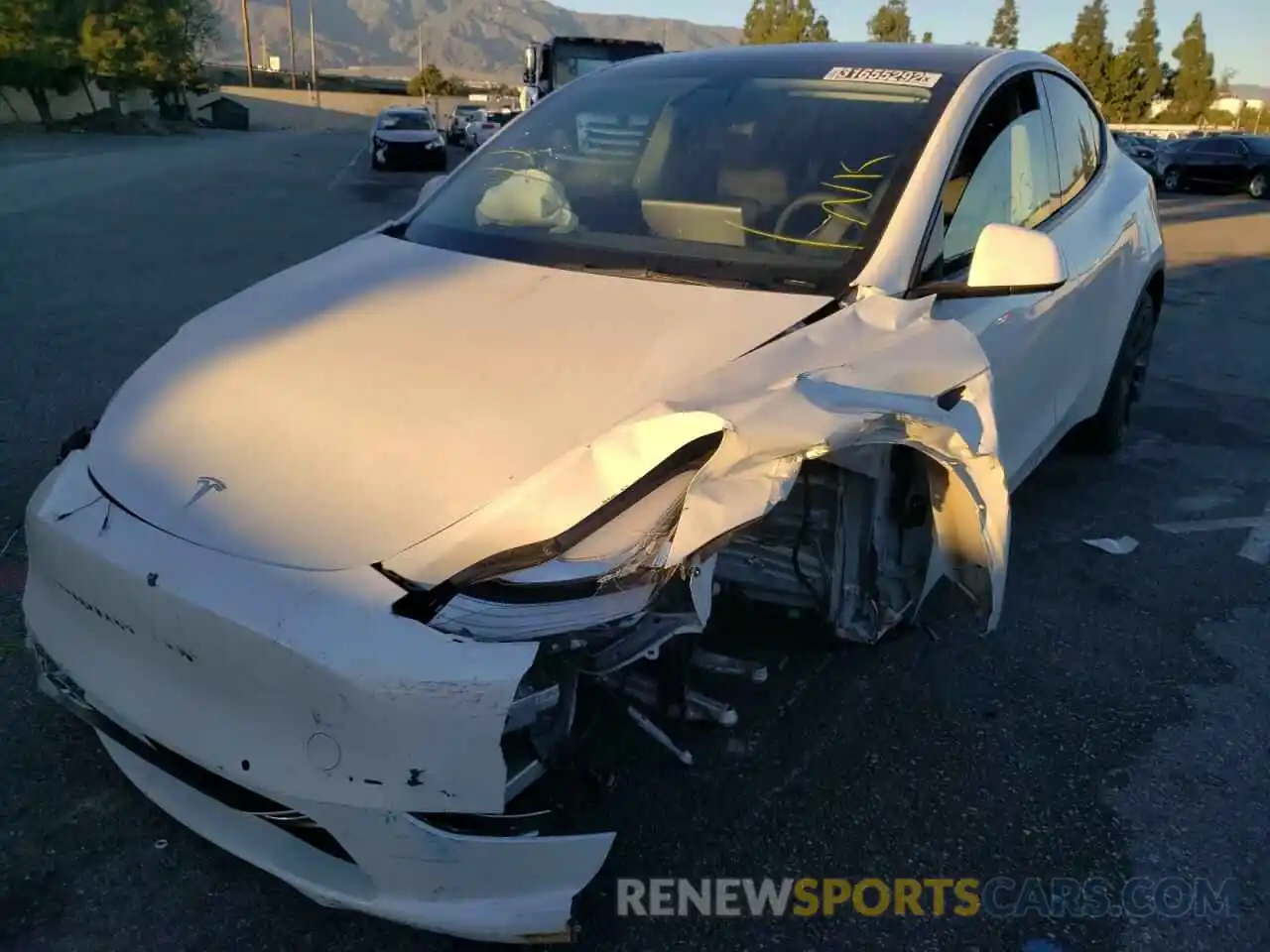 2 Photograph of a damaged car 5YJYGDEE8MF241385 TESLA MODEL Y 2021