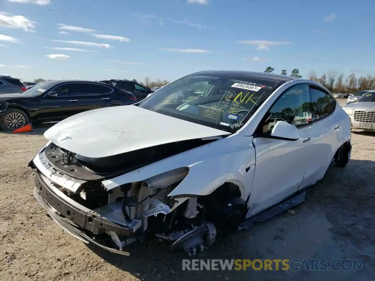 2 Photograph of a damaged car 5YJYGDEE8MF258462 TESLA MODEL Y 2021