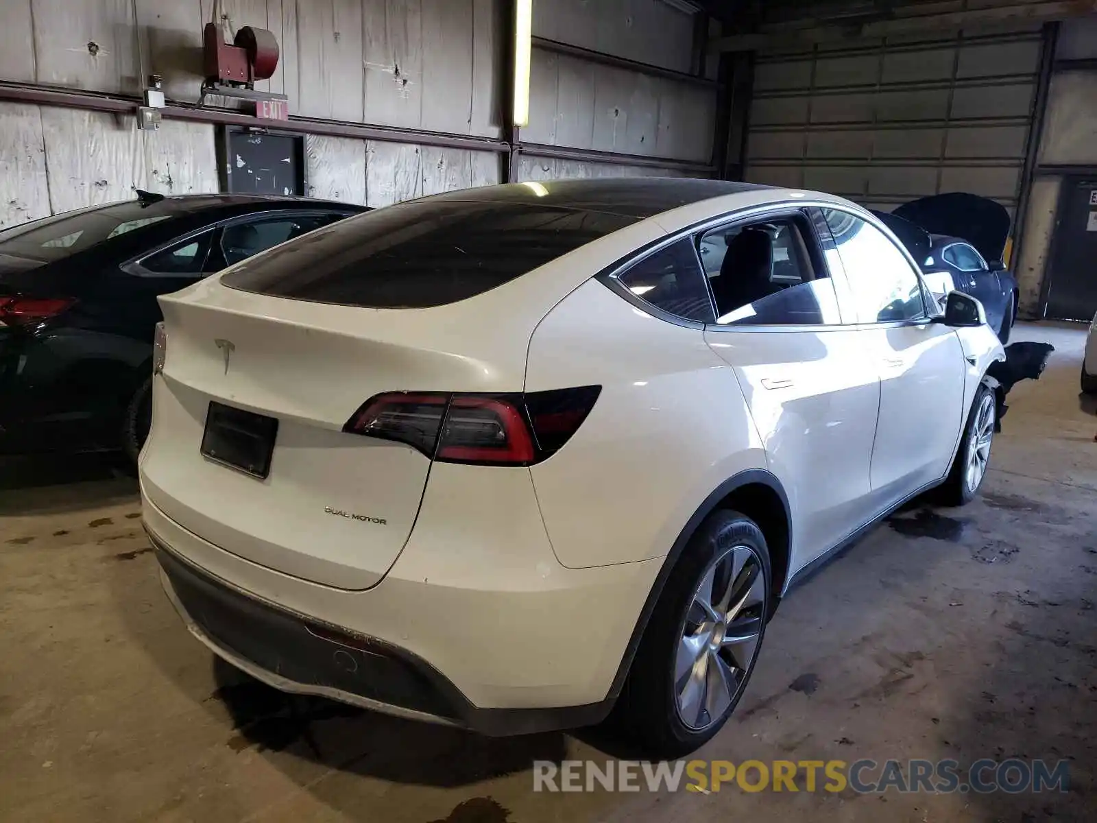 4 Photograph of a damaged car 5YJYGDEE9MF063406 TESLA MODEL Y 2021