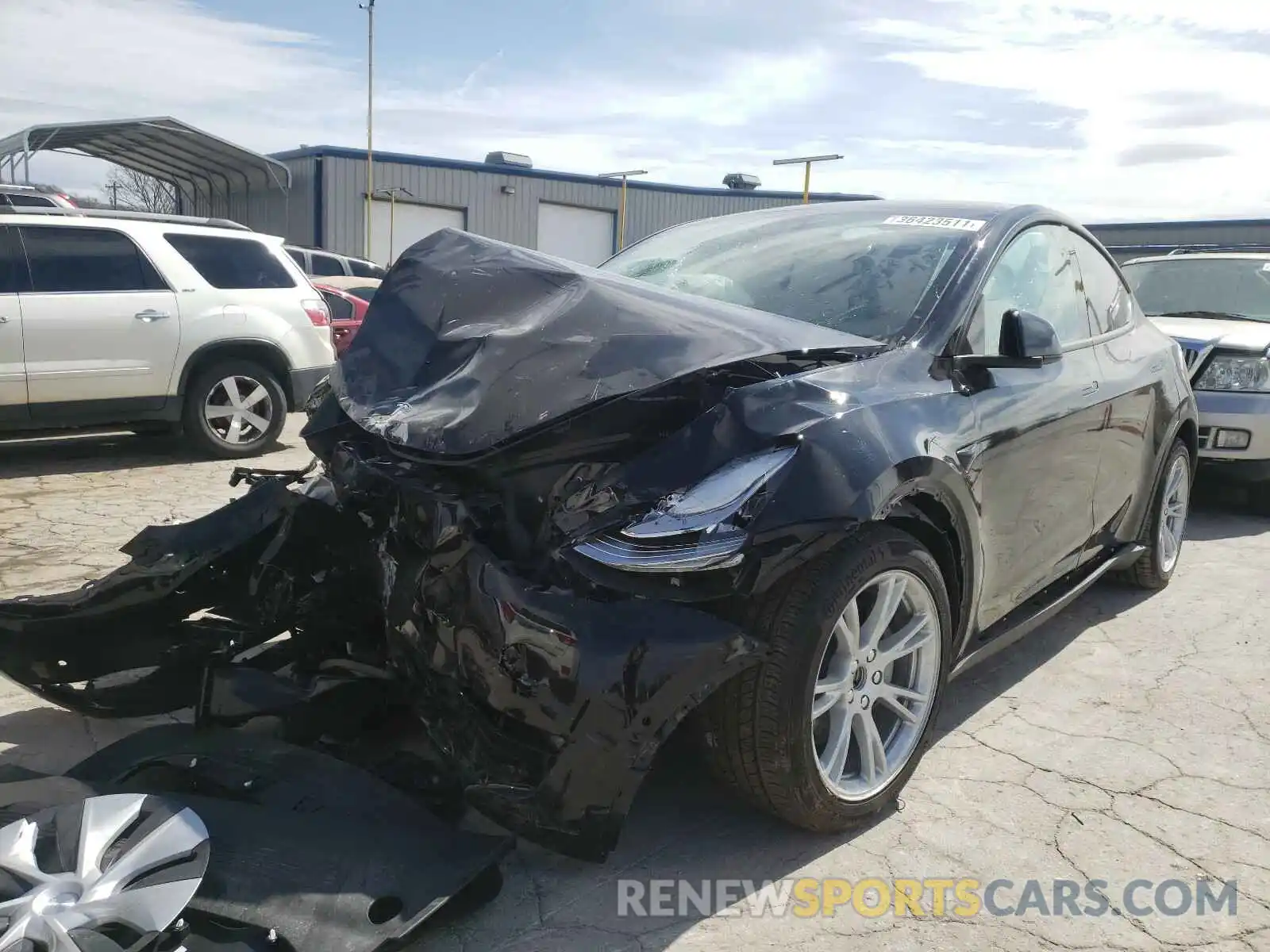 2 Photograph of a damaged car 5YJYGDEE9MF064815 TESLA MODEL Y 2021