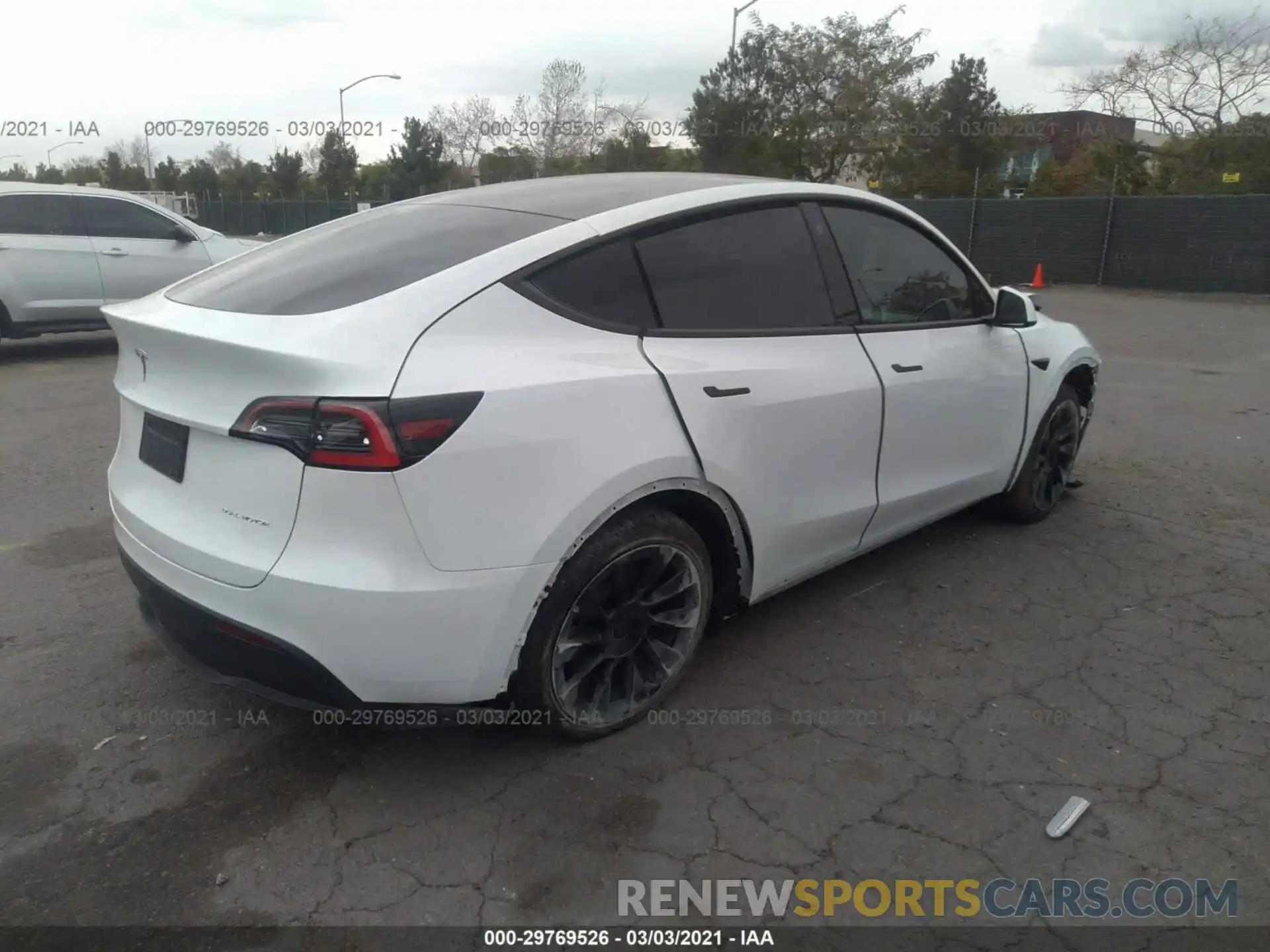 4 Photograph of a damaged car 5YJYGDEE9MF075815 TESLA MODEL Y 2021