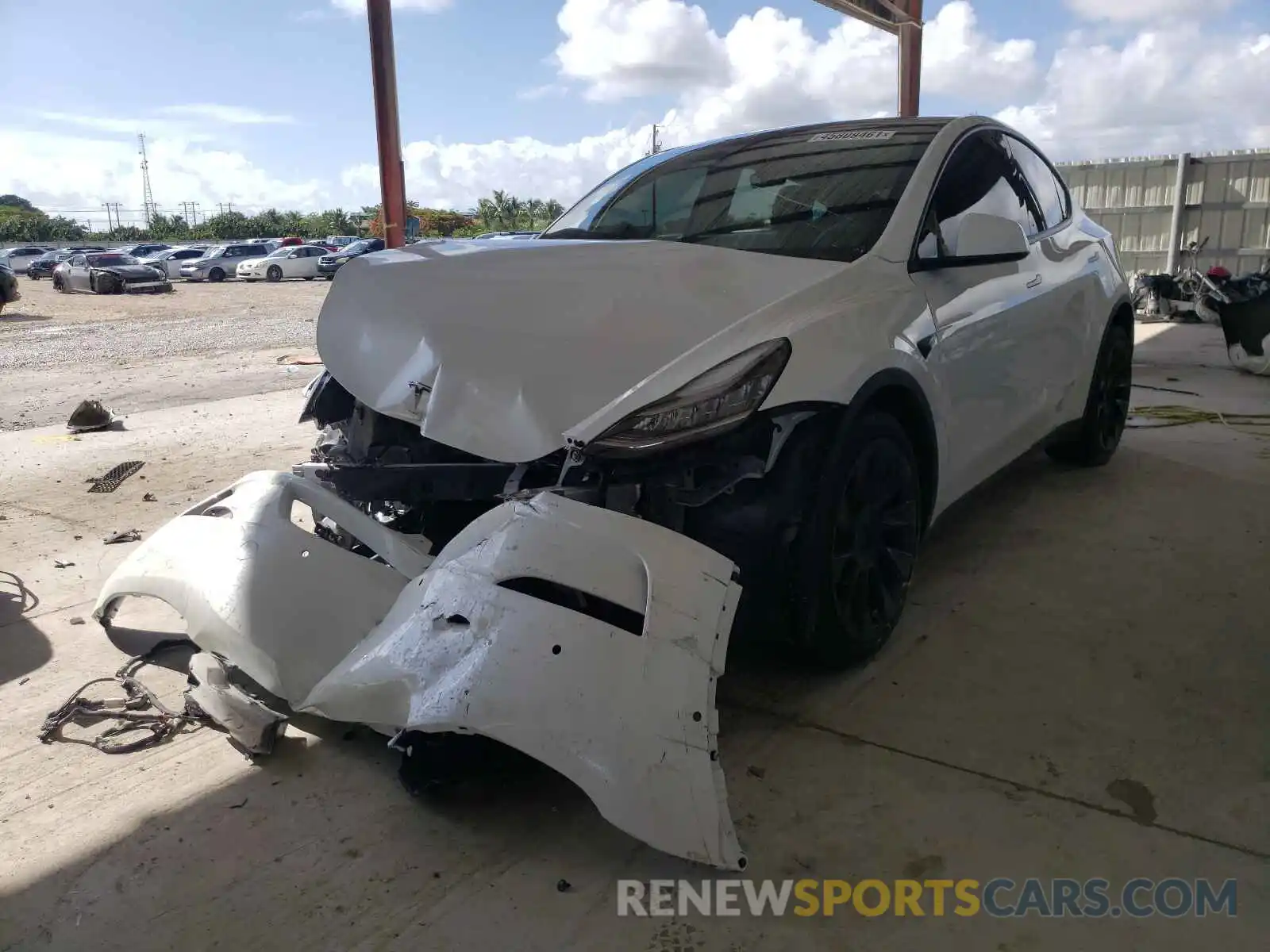 2 Photograph of a damaged car 5YJYGDEE9MF079721 TESLA MODEL Y 2021