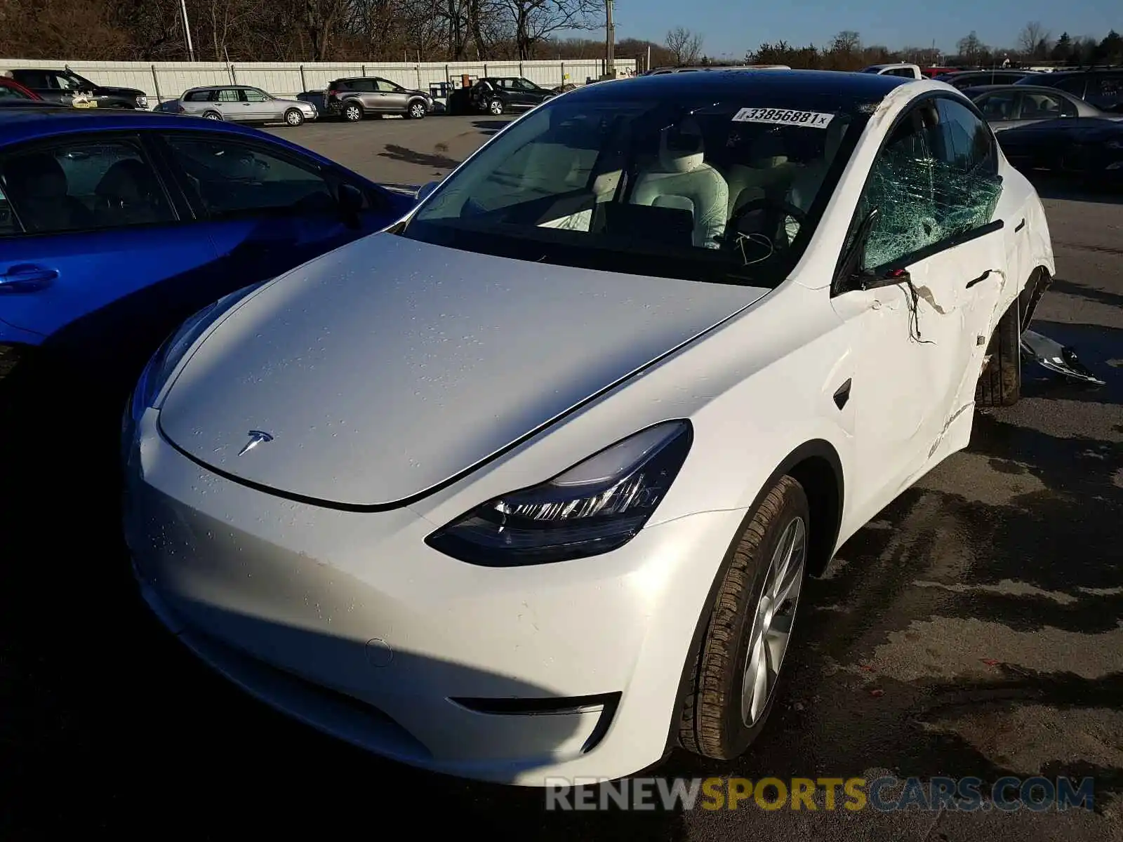 2 Photograph of a damaged car 5YJYGDEE9MF085597 TESLA MODEL Y 2021