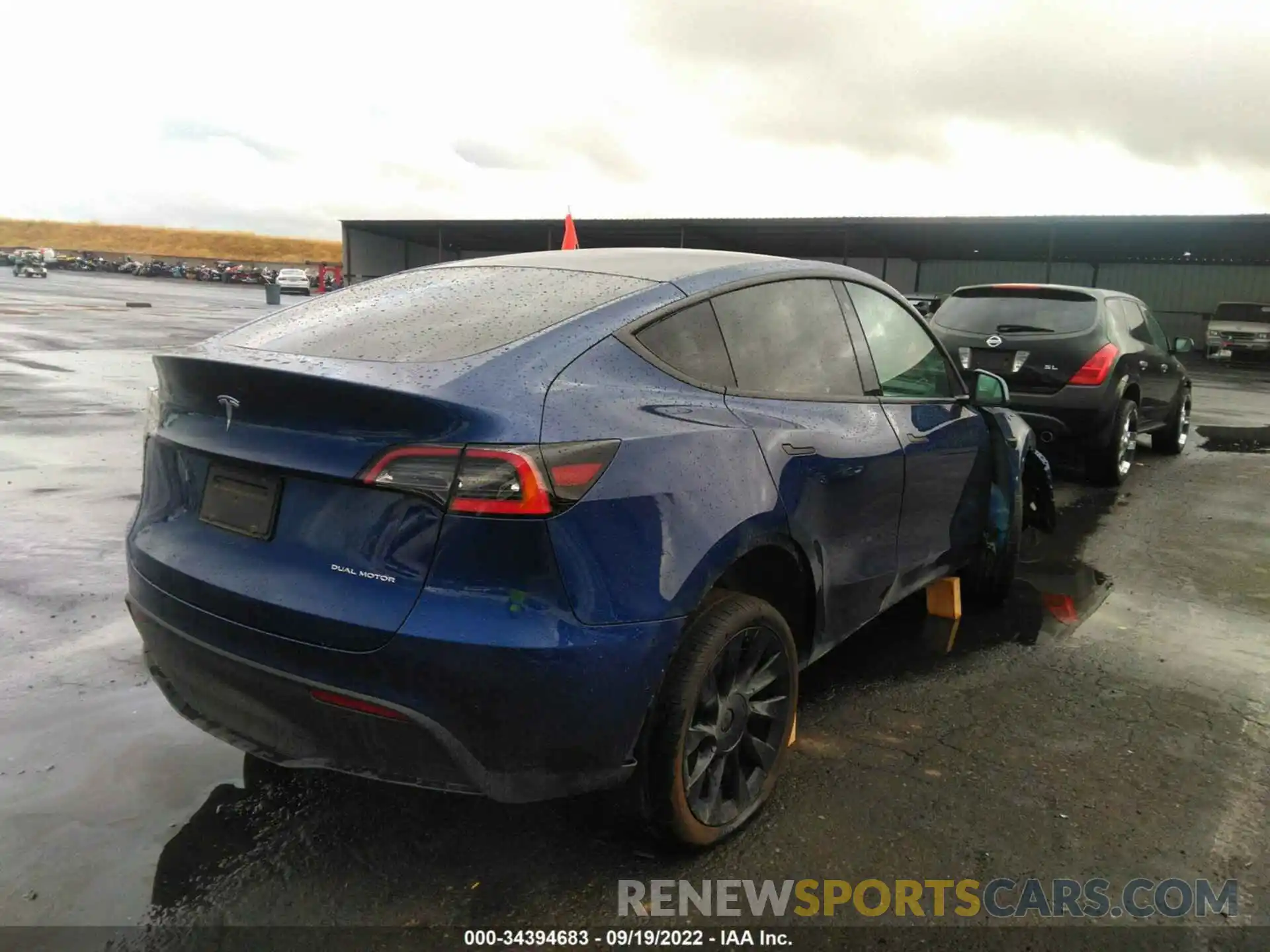 4 Photograph of a damaged car 5YJYGDEE9MF093201 TESLA MODEL Y 2021